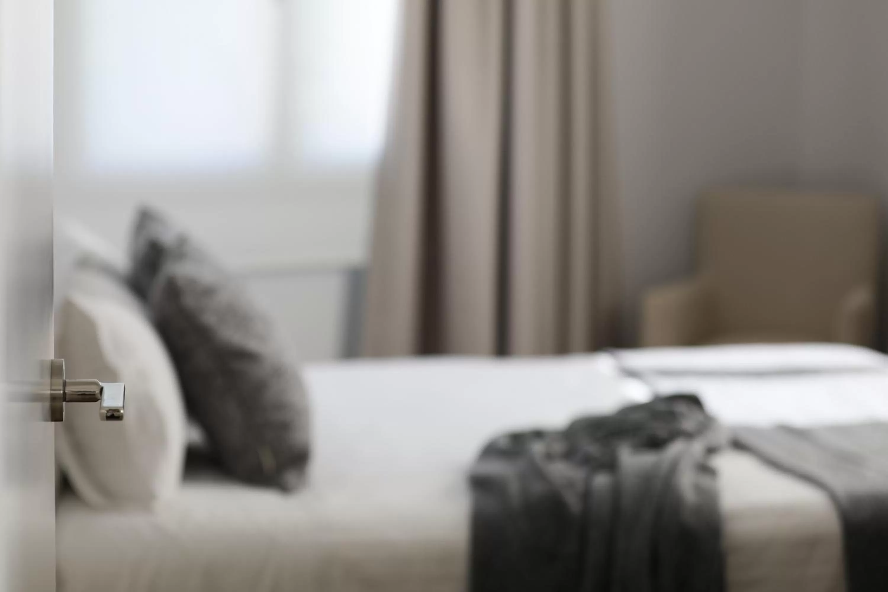 Bed in Le Petit Boutique Hotel