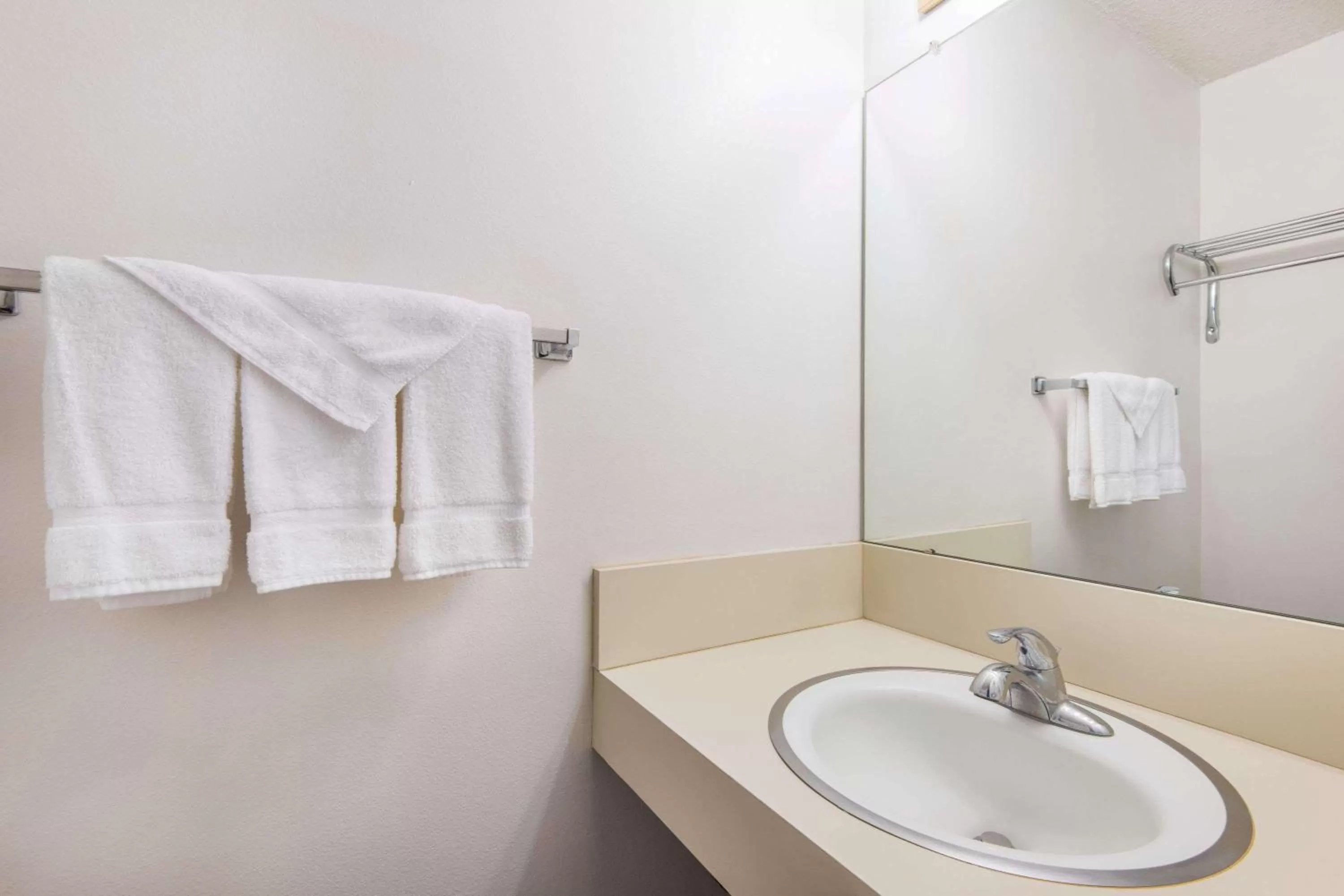 Bathroom in Travelodge by Wyndham Laramie