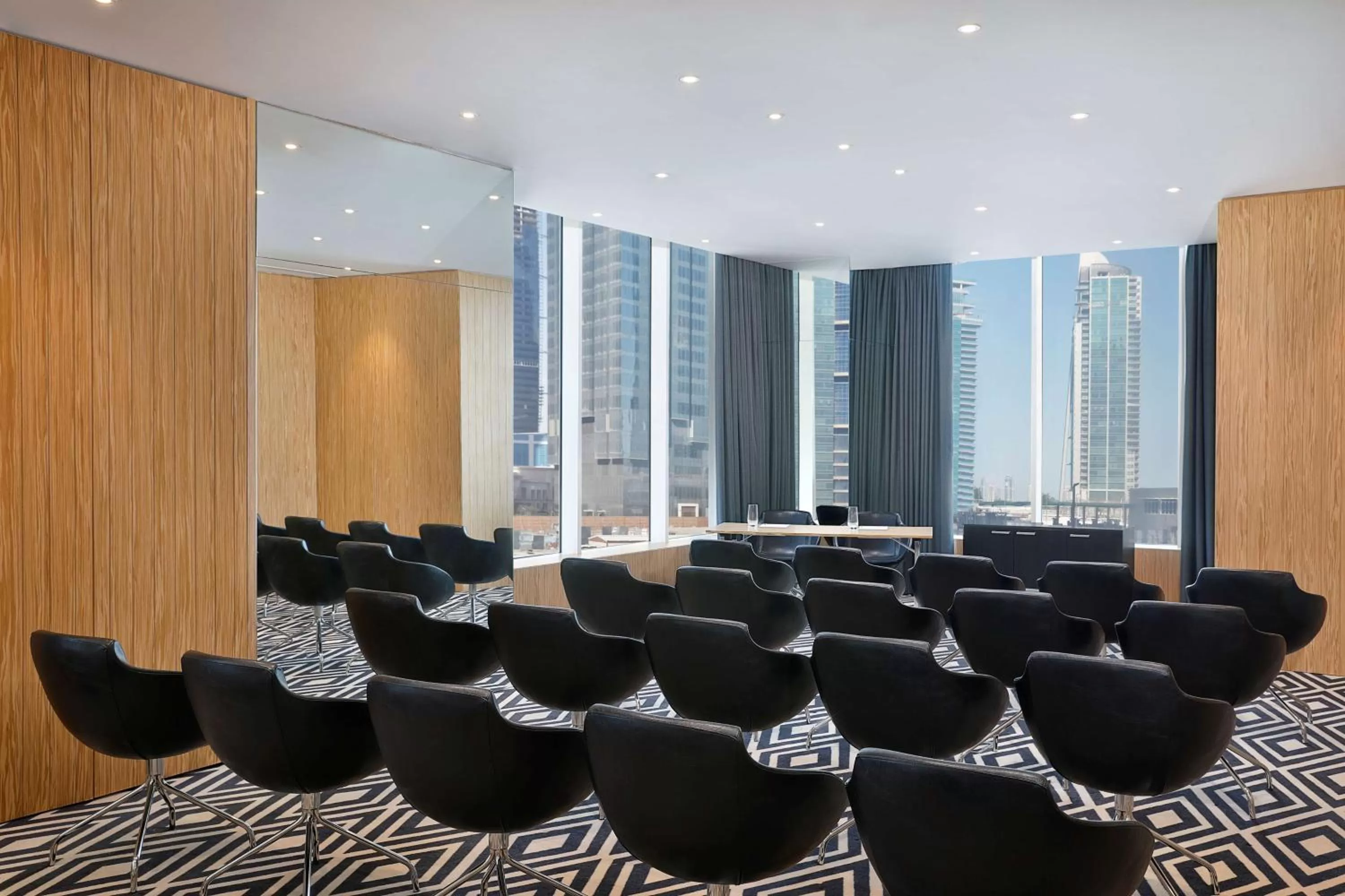 Meeting/conference room in Aleph Doha Residences, Curio Collection By Hilton