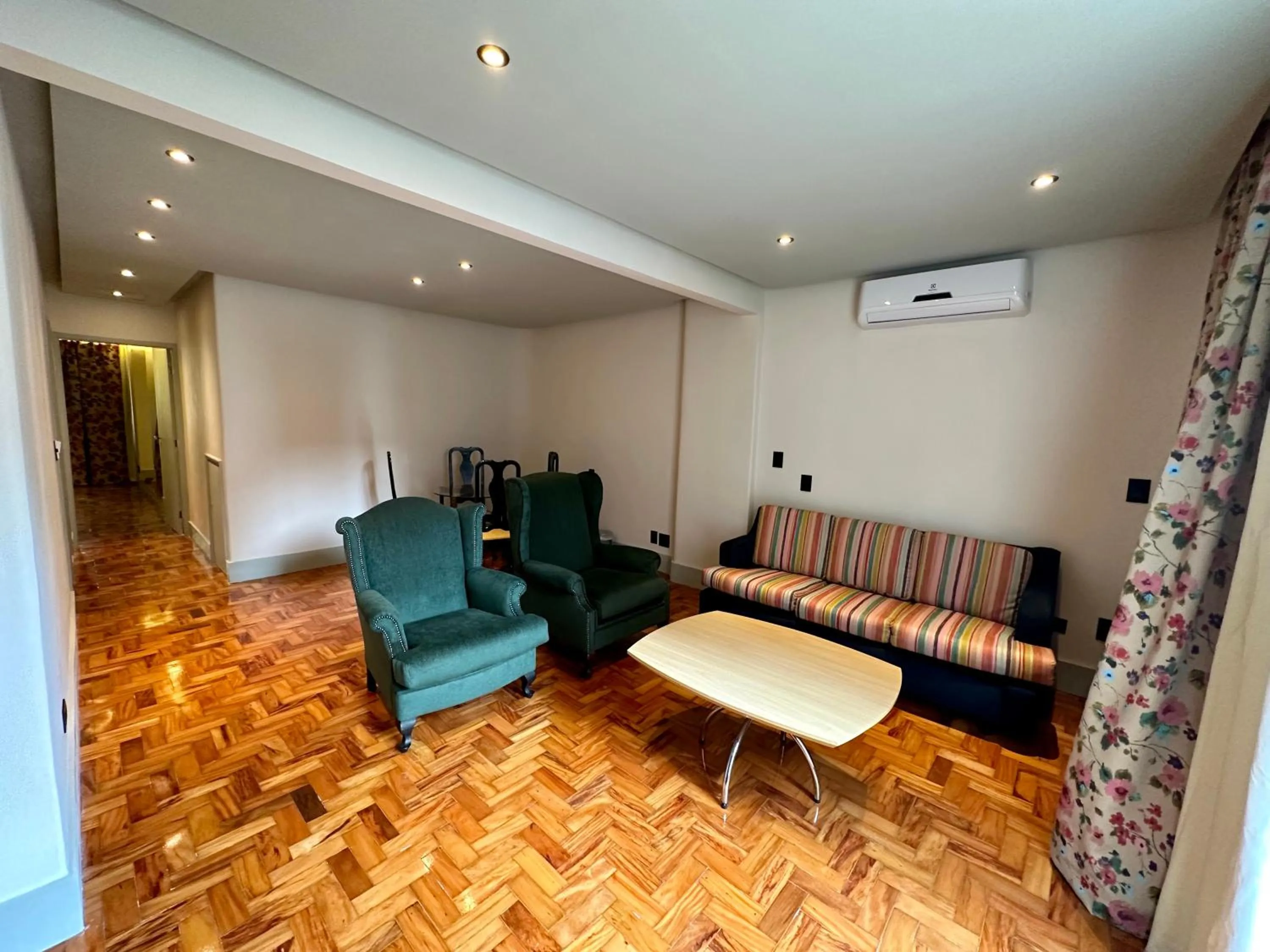 Communal lounge/ TV room in San Michel Hotel