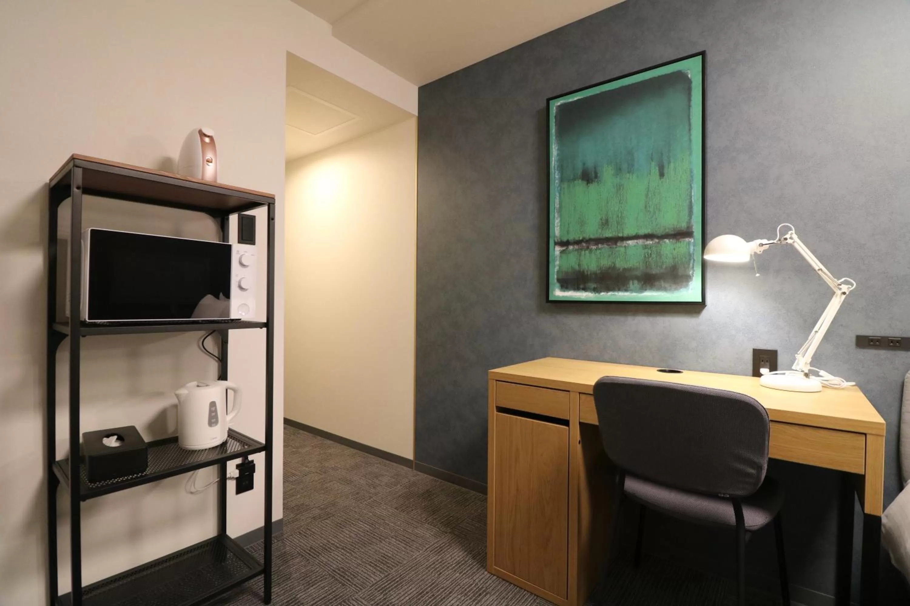 Kitchen or kitchenette in TAKETO STAY PREMIERE SAPPORO Eki