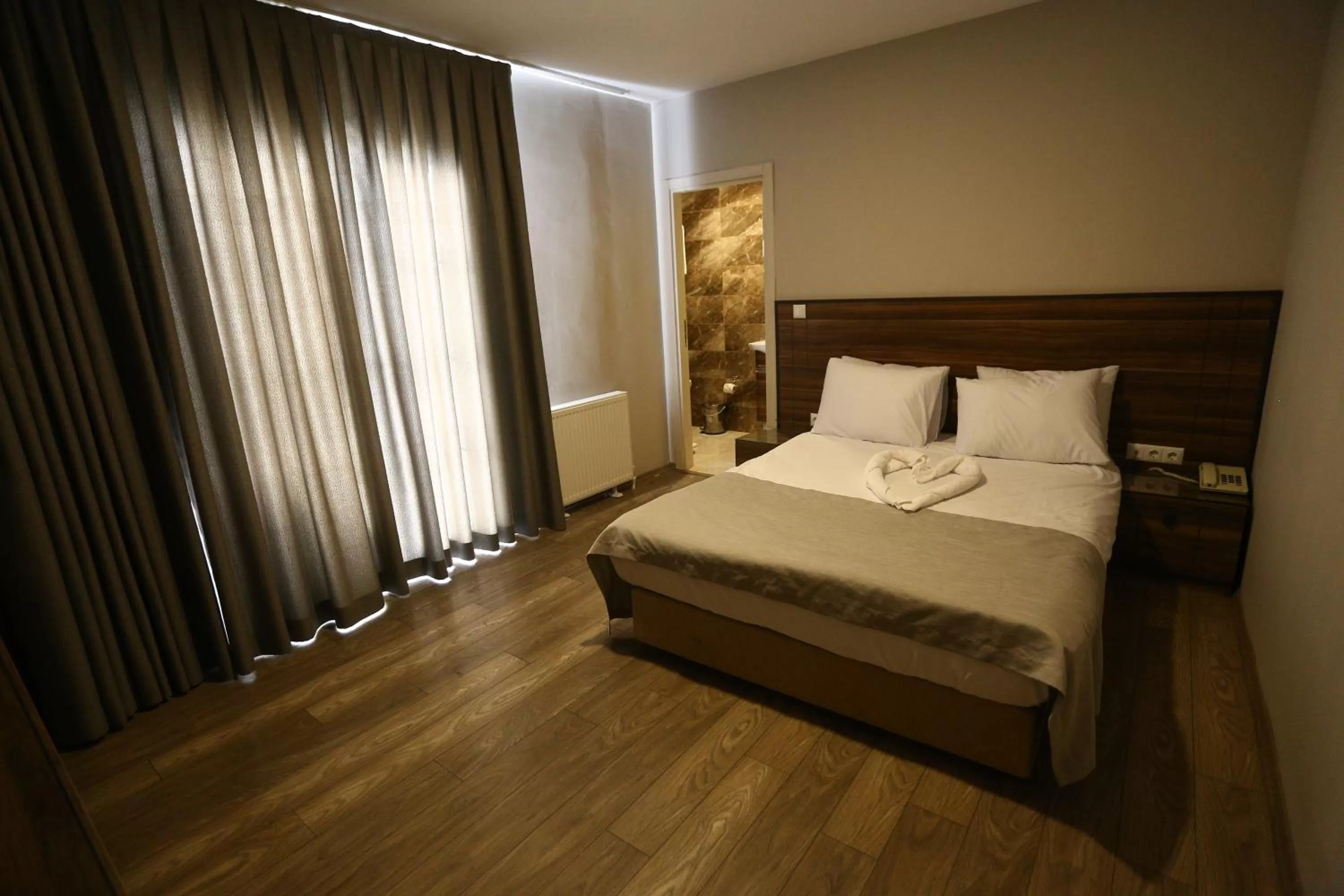 Bed in Albatros Premier Hotel