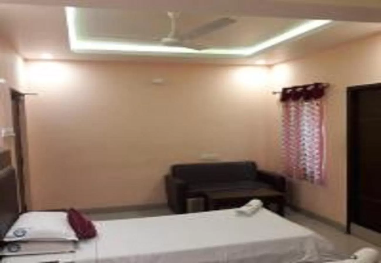 Bedroom in Hotel Ramco Residency A/c