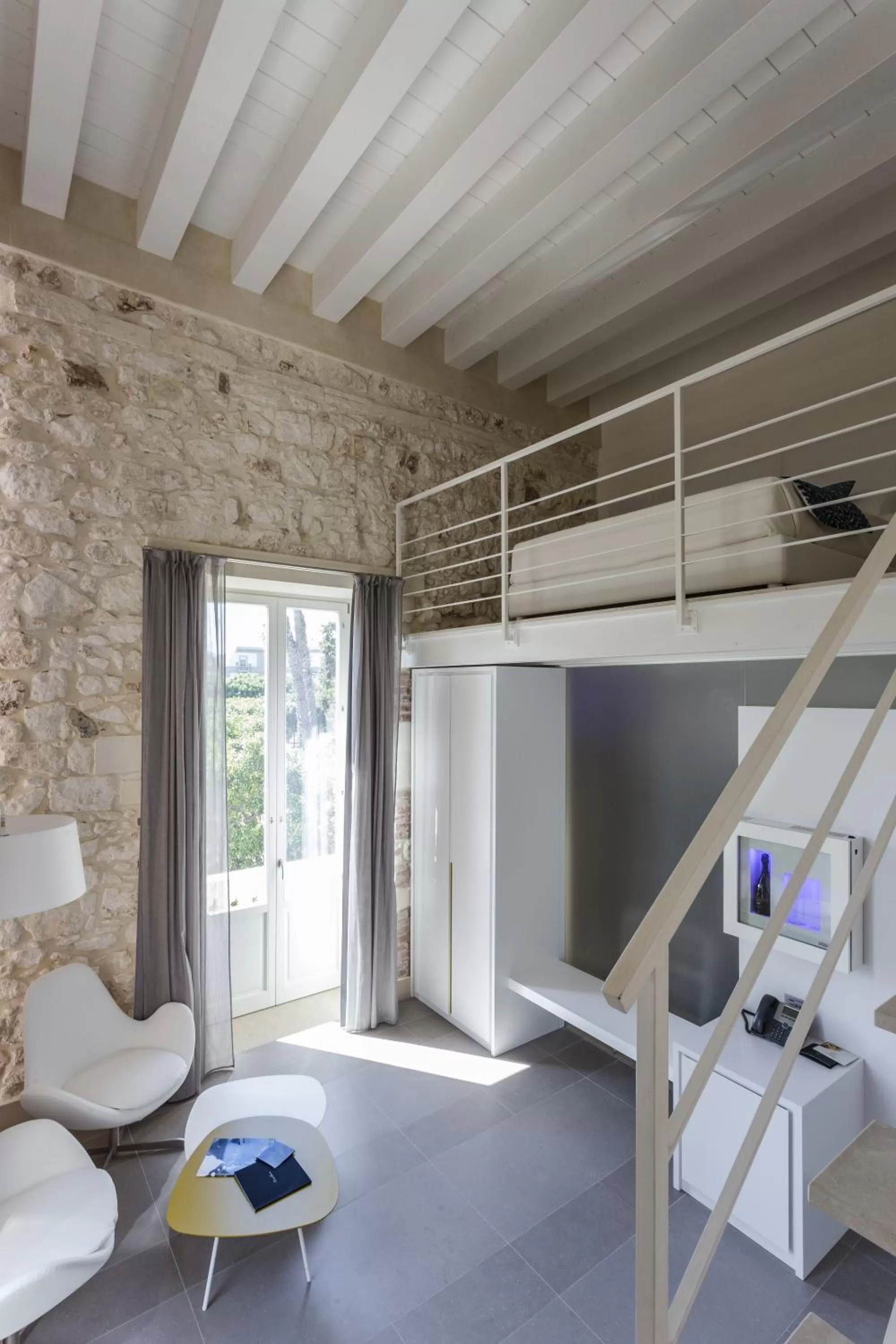 Bed in Caportigia Boutique Hotel