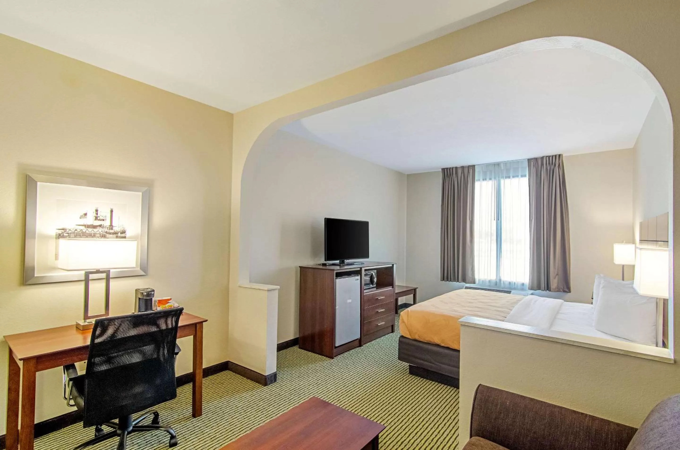Photo of the whole room, Bed in Quality Inn & Suites Near Tanger Outlet Mall