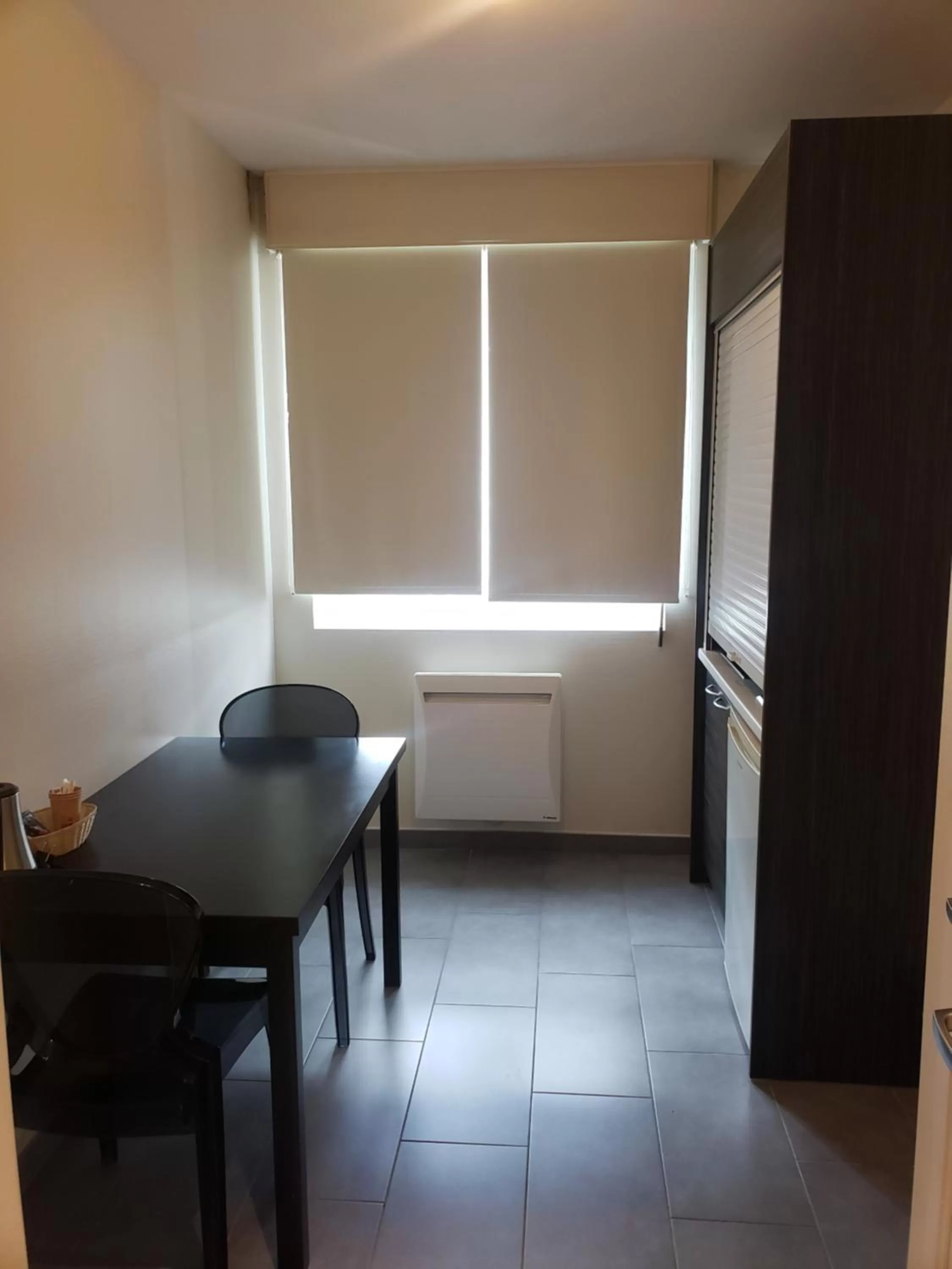 Kitchen or kitchenette in Kyriad Hotel Tours Centre