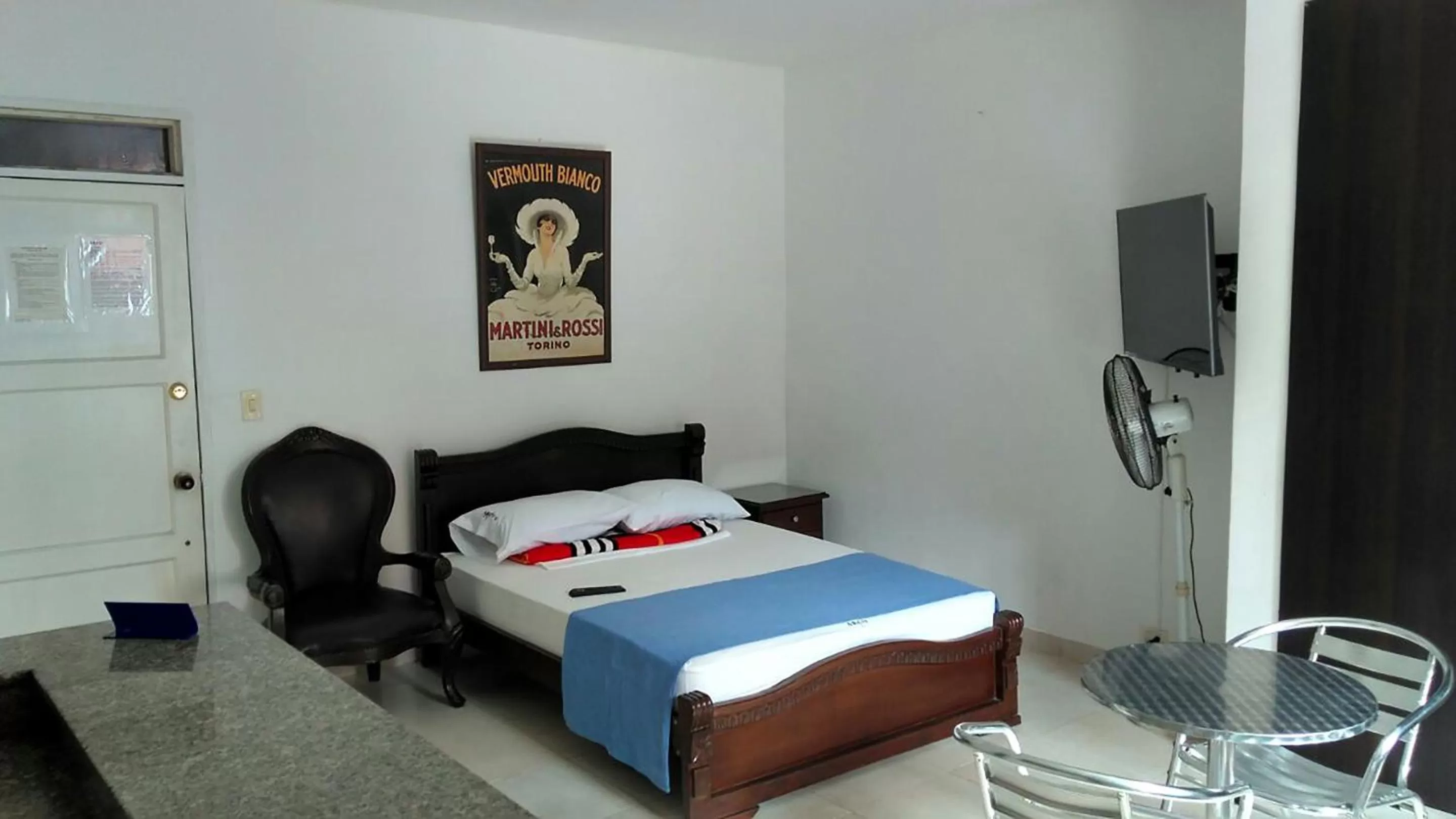 Bed in Arco Apartasuites