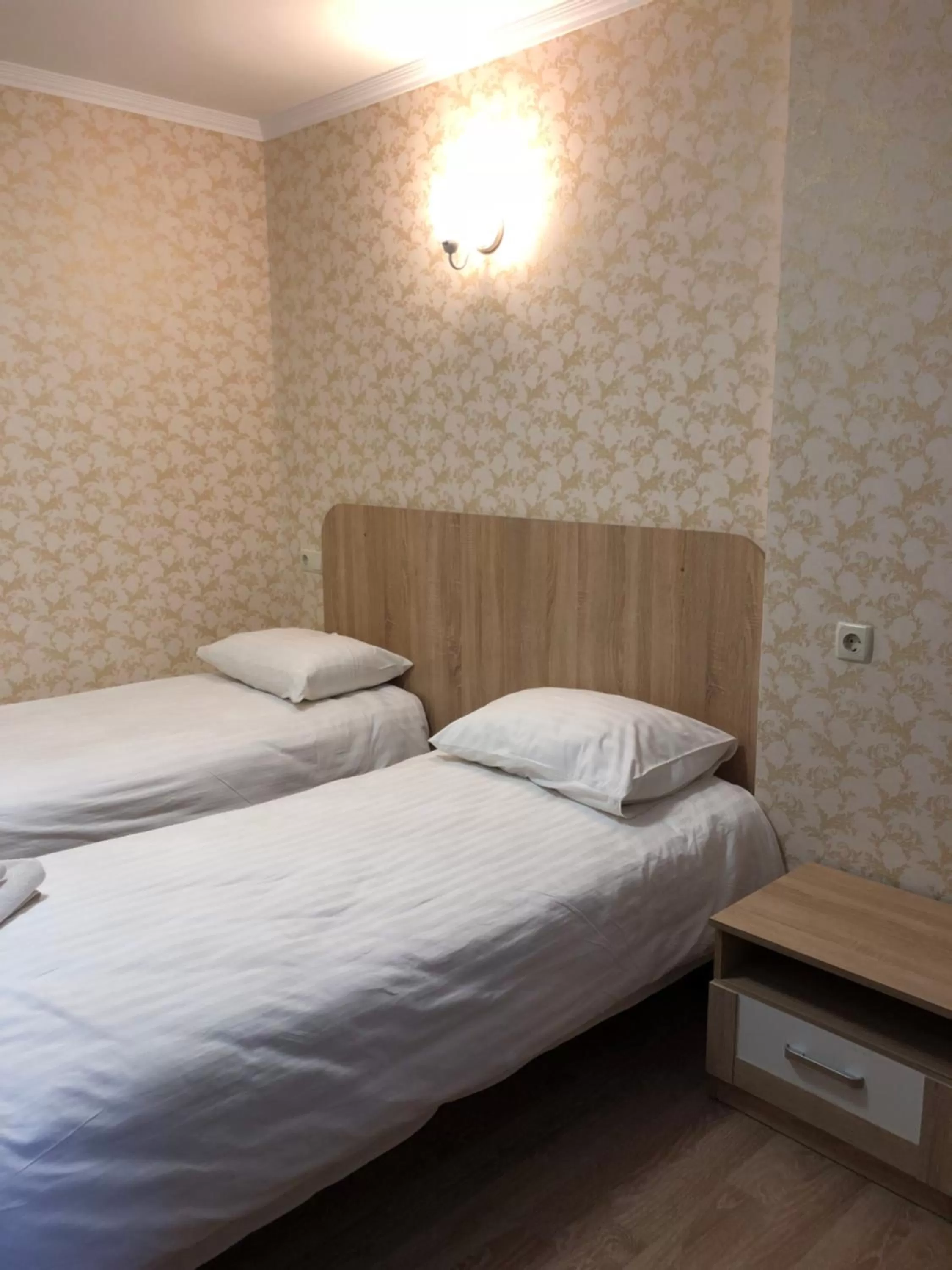 Bed in Zhuliany City Hotel