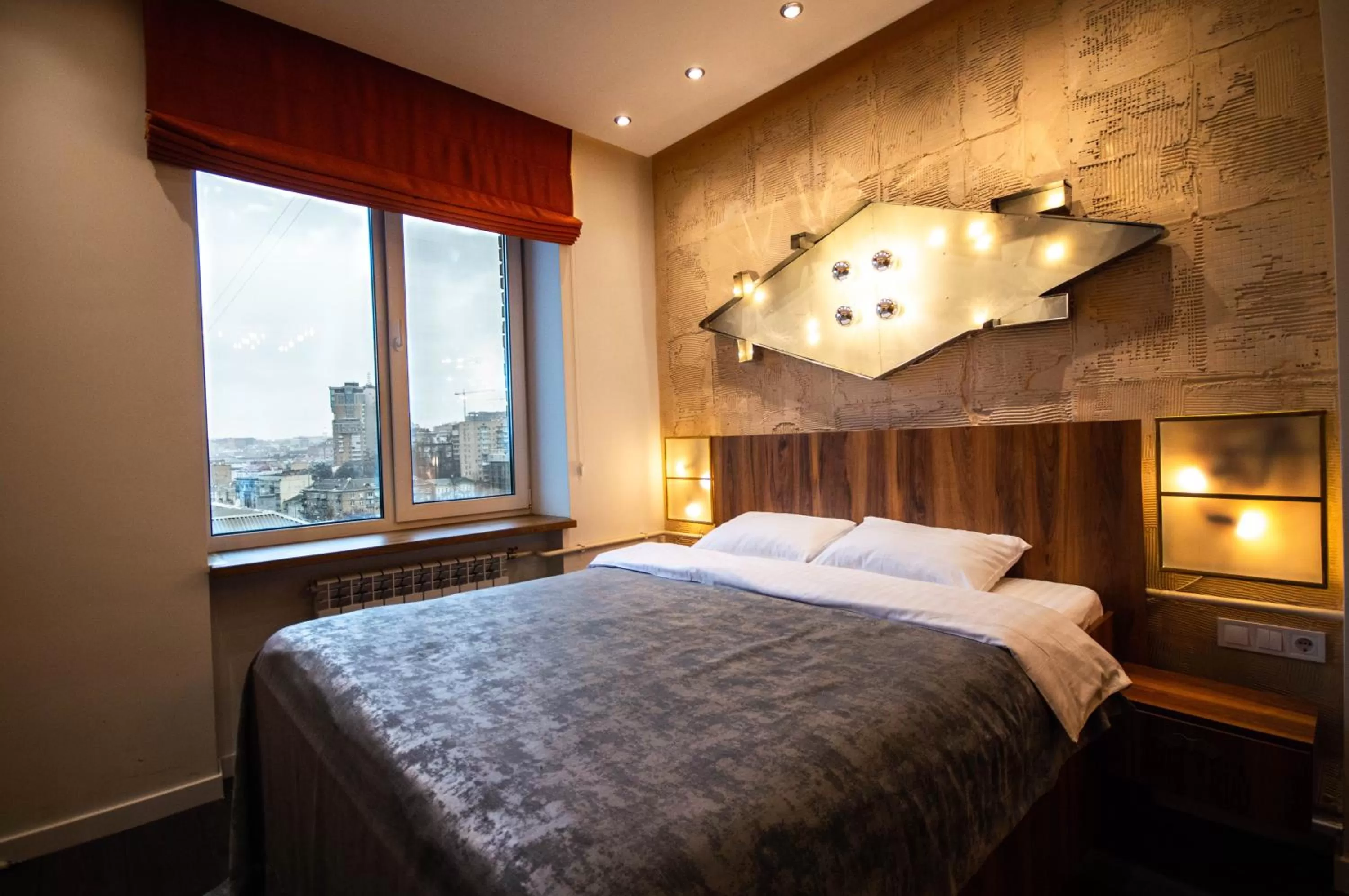 Bed in Kyiv Panorama Apartments near Gulliver