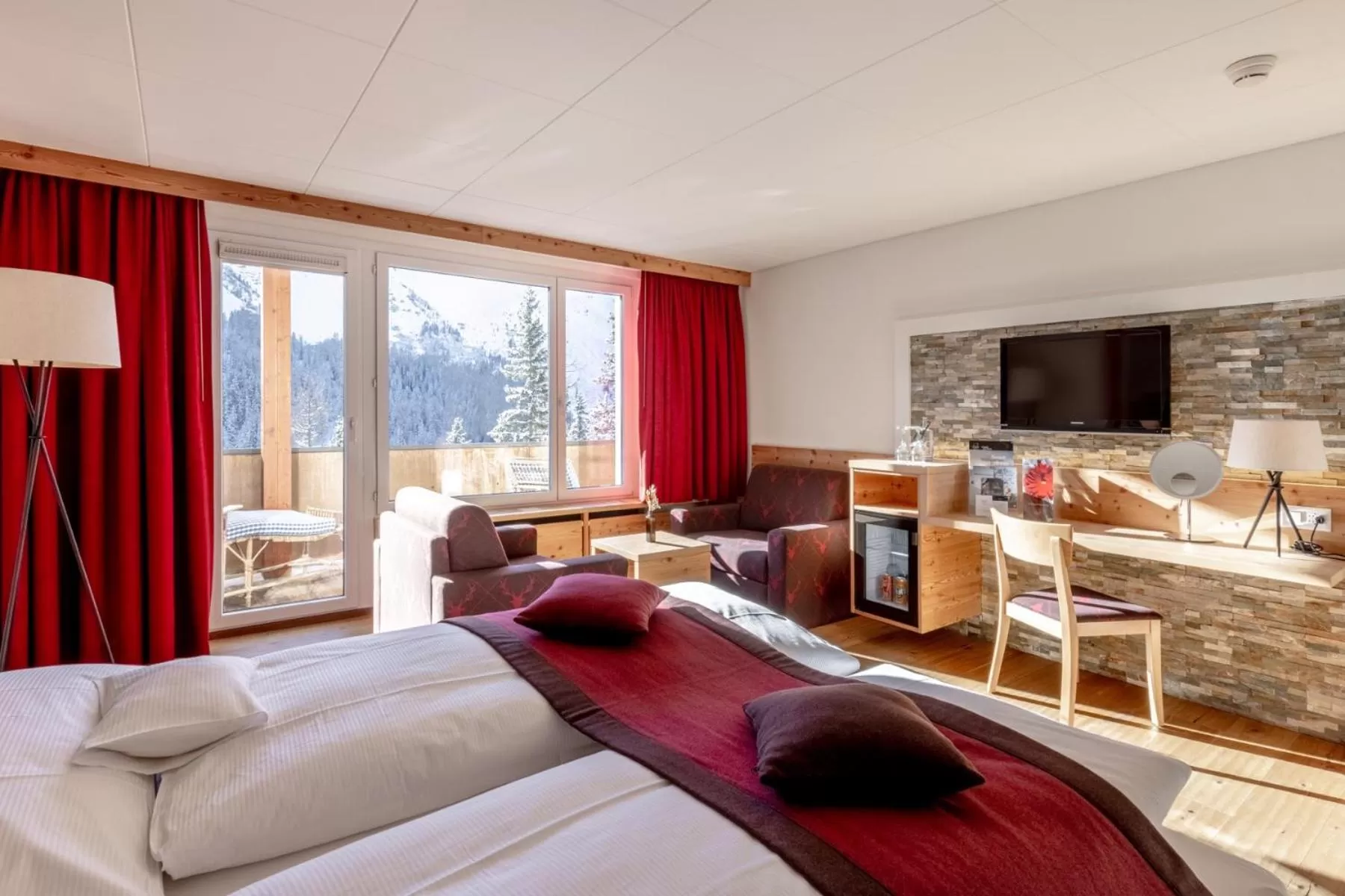 Photo of the whole room, Bed in Blatter's Arosa Hotel & Bella Vista SPA