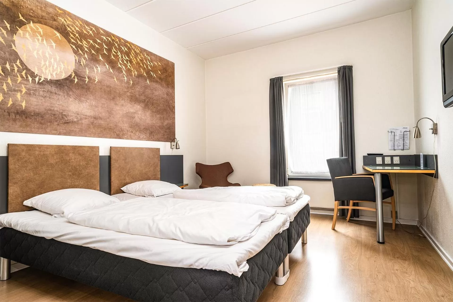 Bed in City Hotel Nattergalen