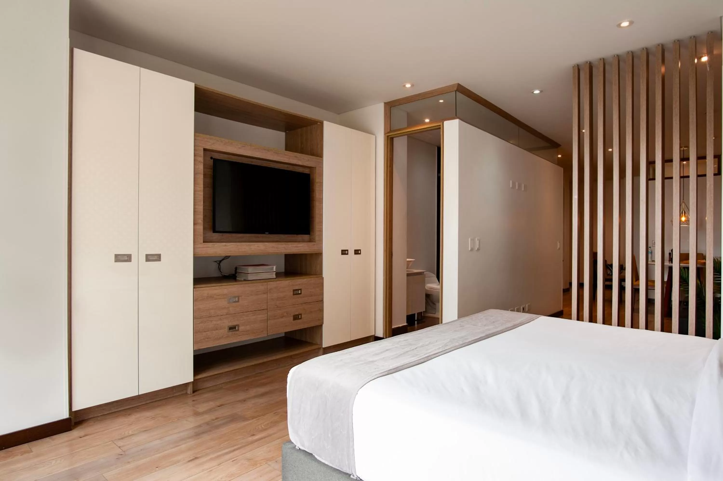 Bed in Hemma Bogotá Country Luxury Suites Hotel