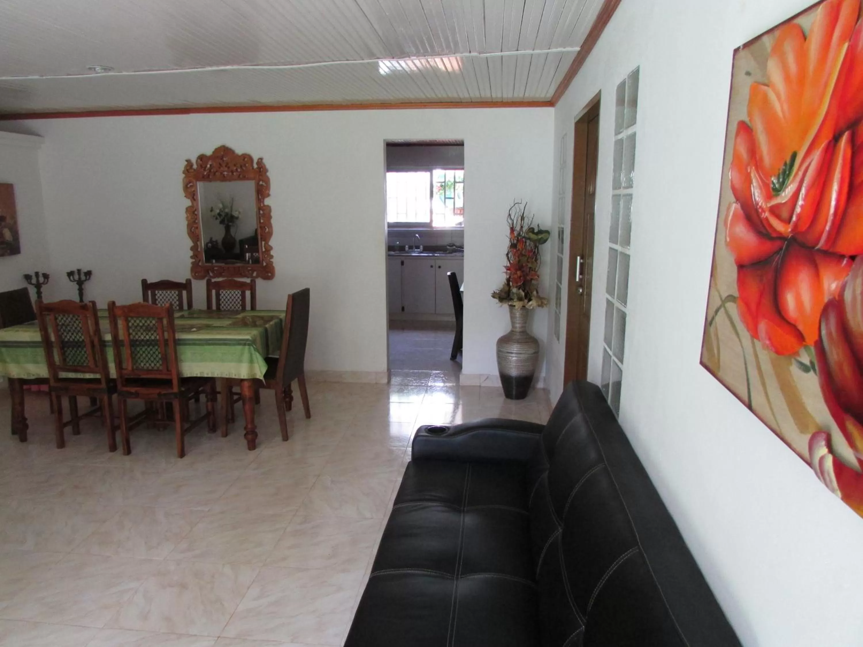 Communal lounge/ TV room in Posada Hostal Miss Marlly