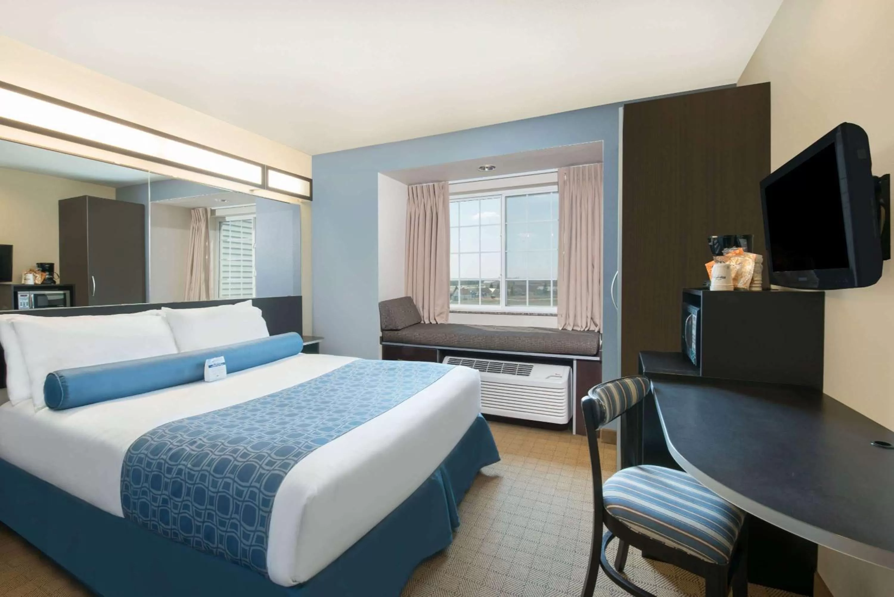 Photo of the whole room, Bed in Microtel Inn & Suites by Wyndham Stanley