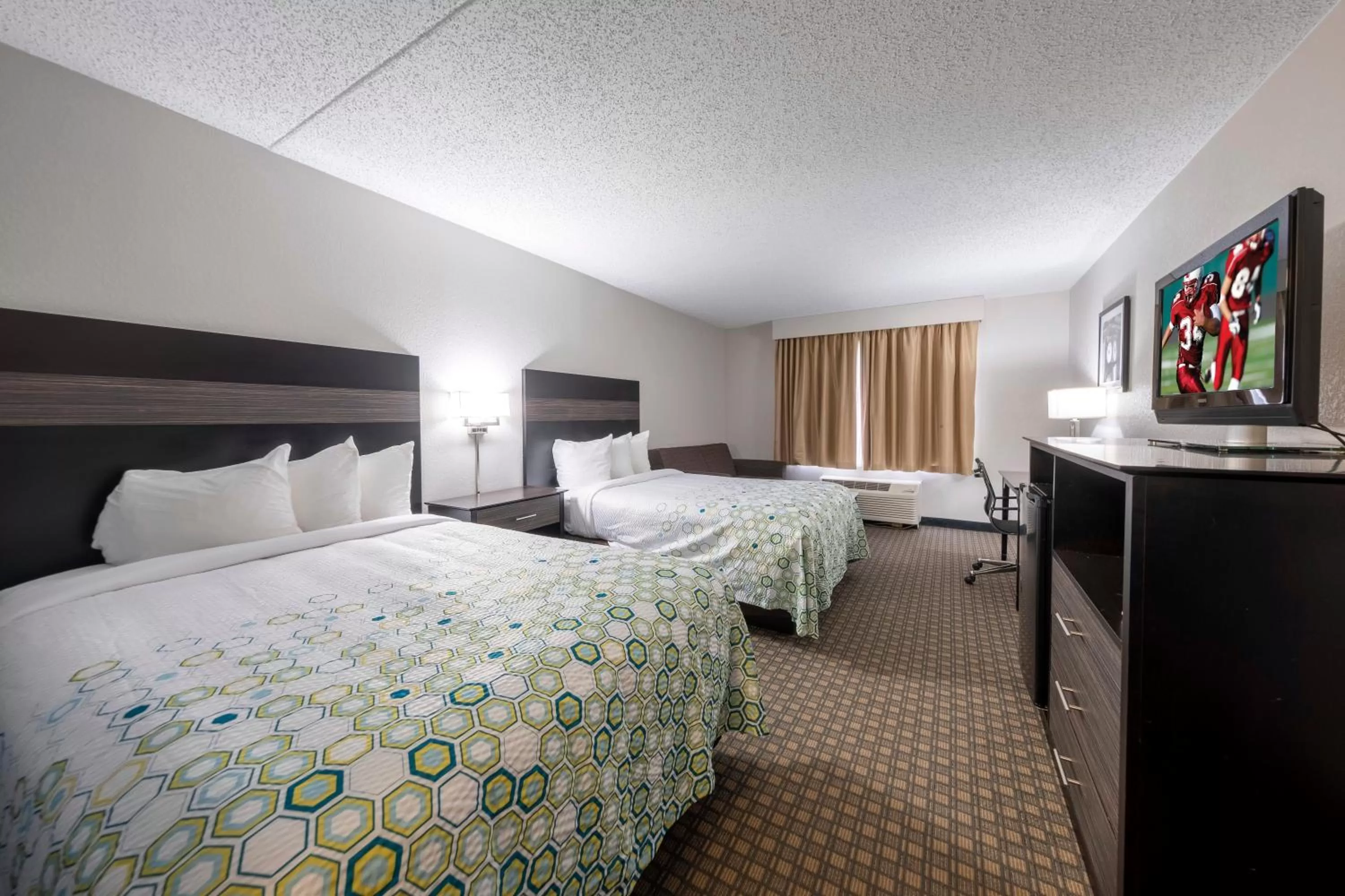 Photo of the whole room, Bed in HomeTown Inn by Red Roof East Syracuse