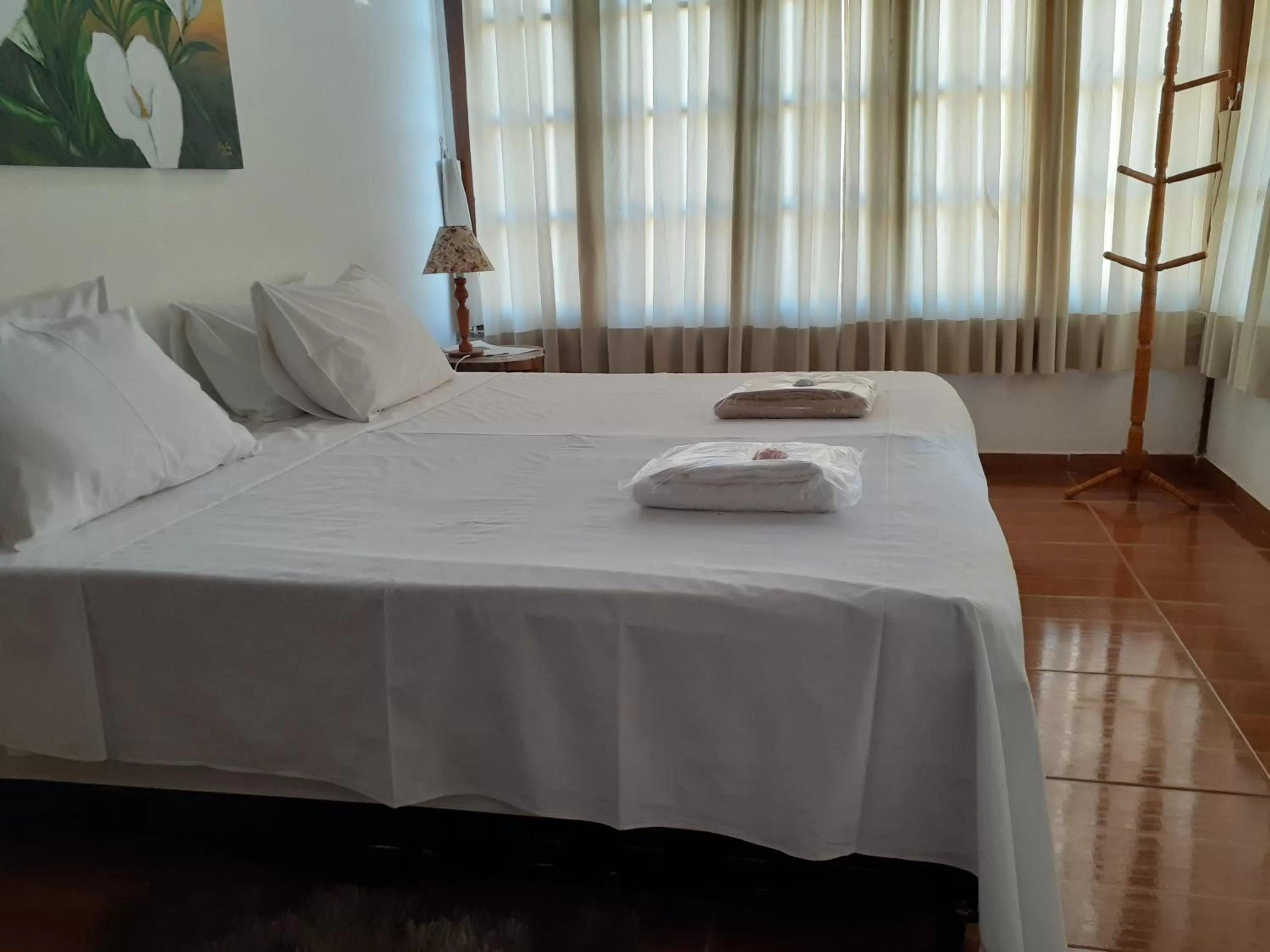 Bed in Pousada R.N.C. Nosso Paraíso