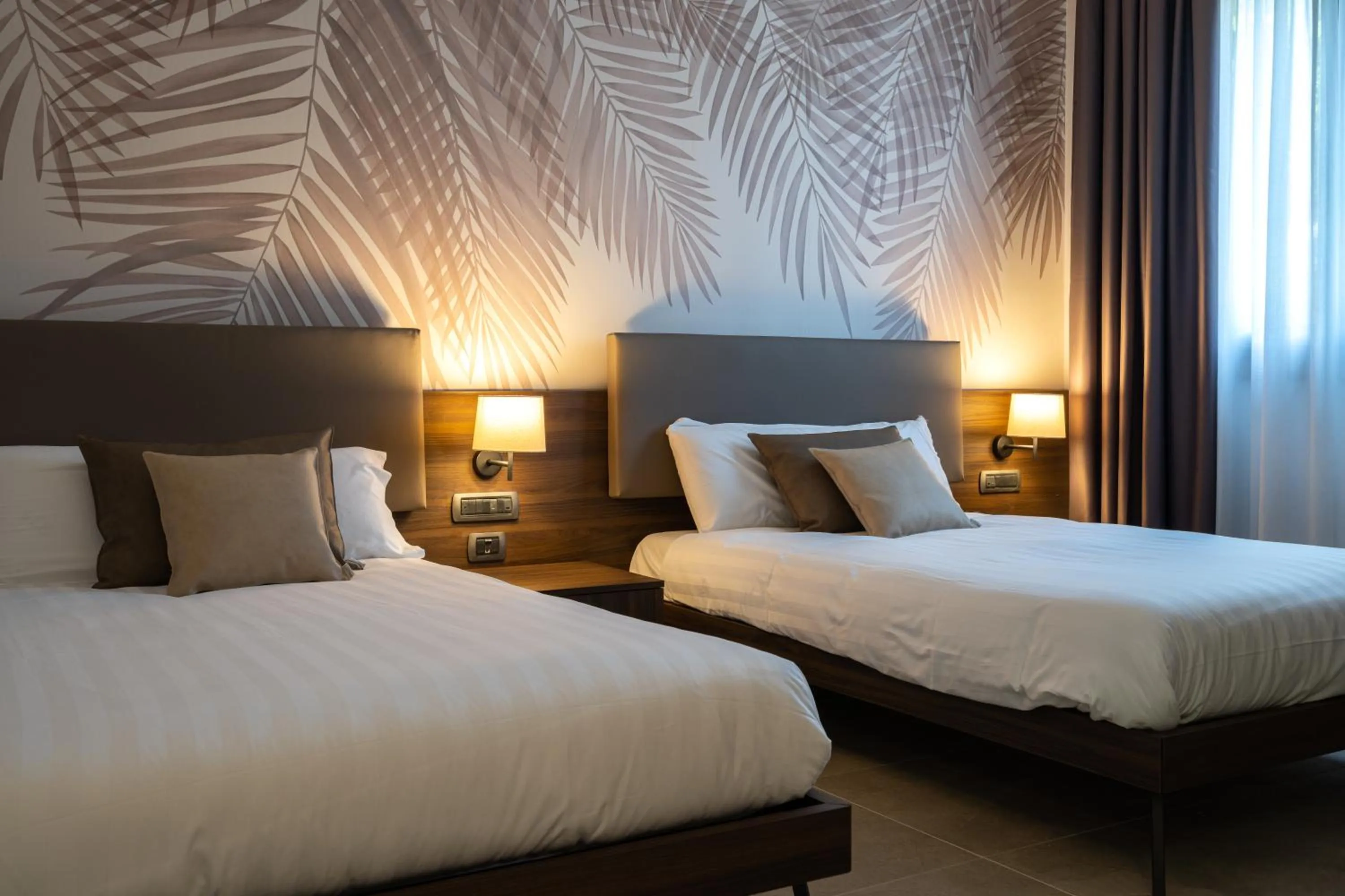 Bed in Ulivi Hotel & Residence