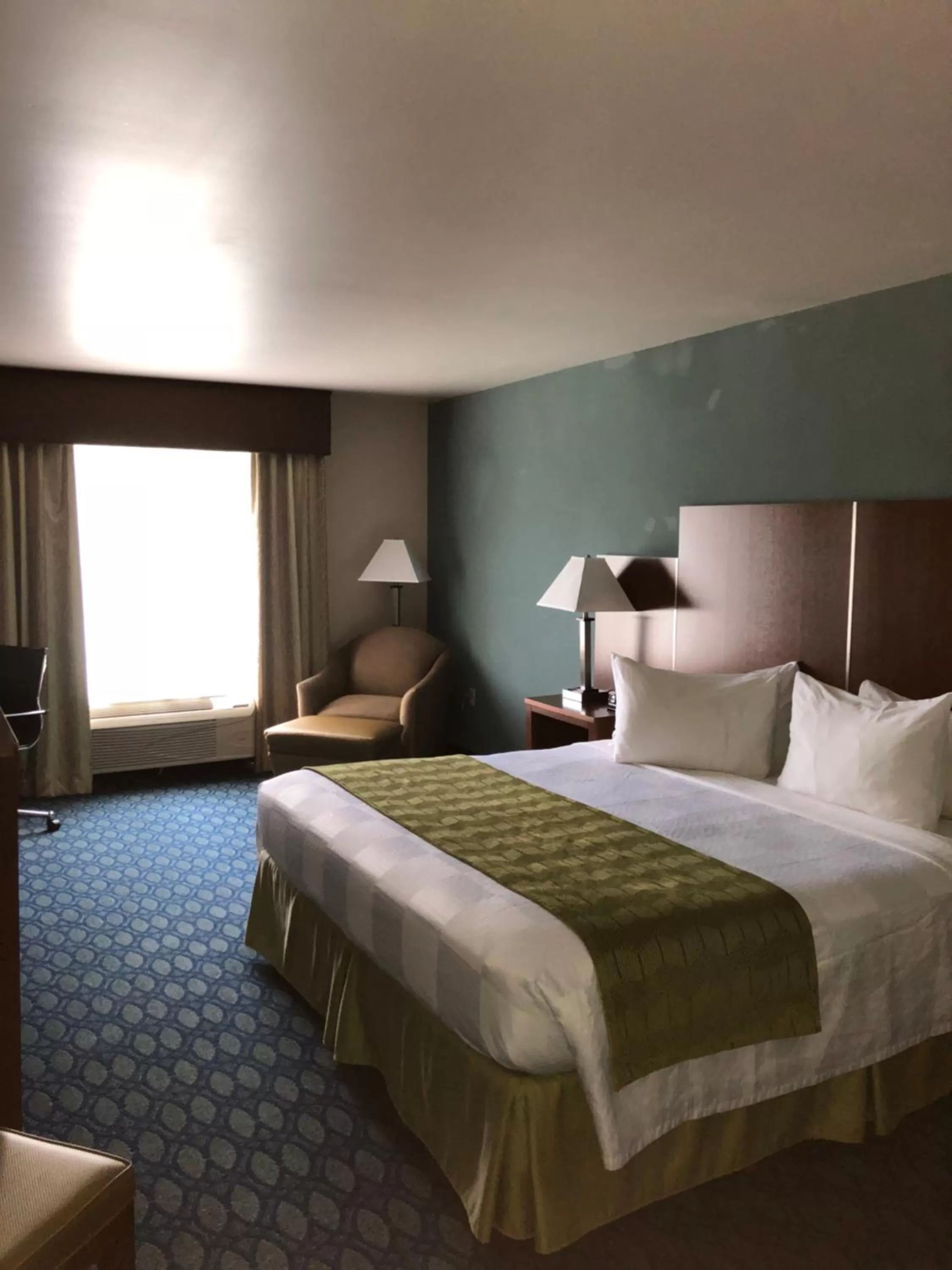 Bed in Countryview Inn & Suites