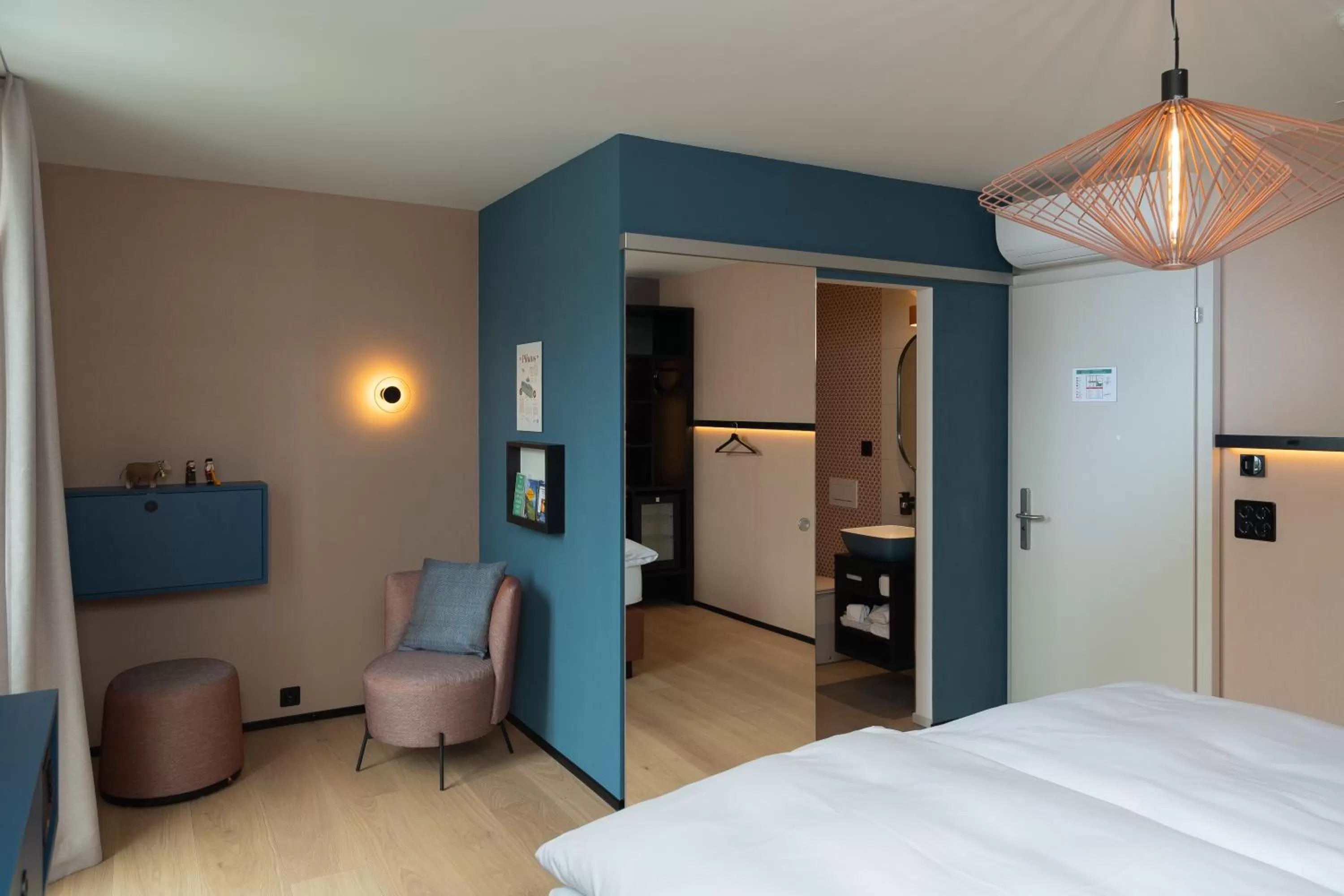 Seating area, Bed in Boutique Hotel Stanserhof