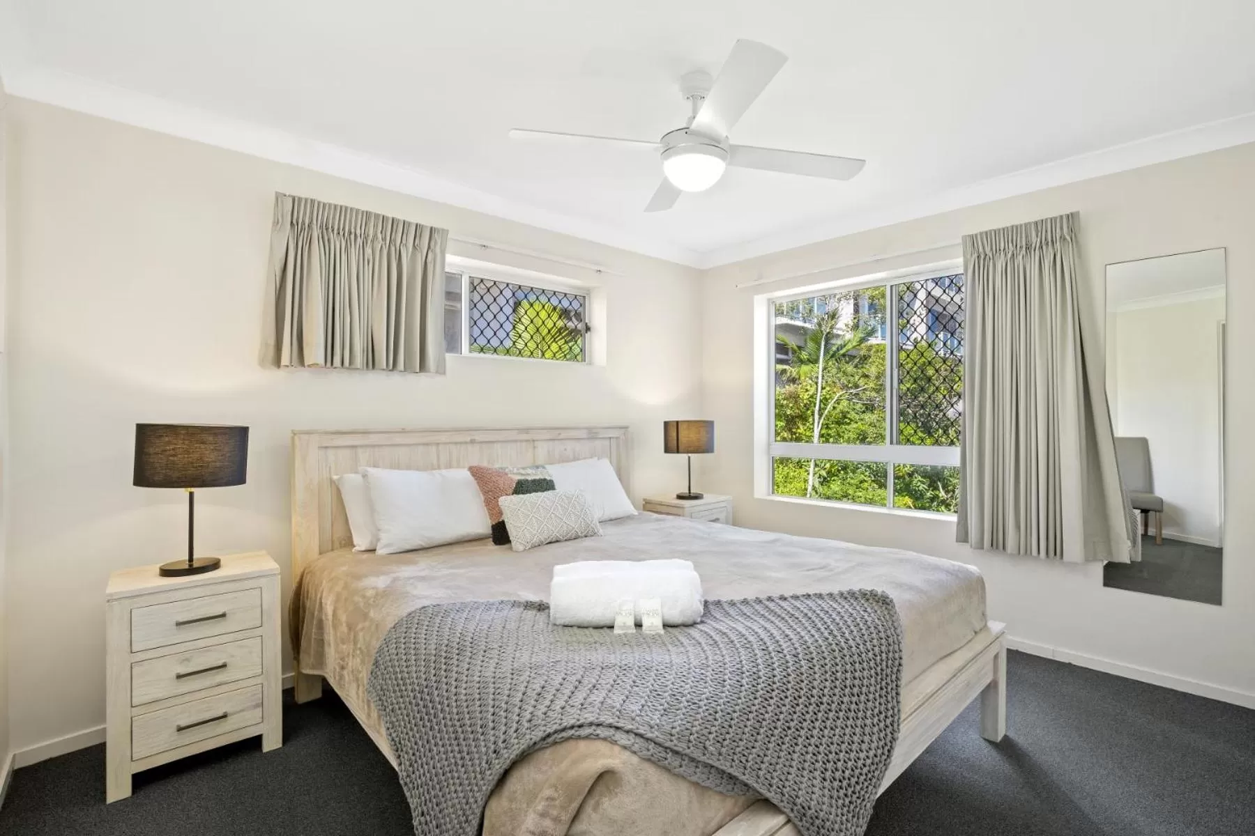 Bed in Kirra Palms Holiday Apartments