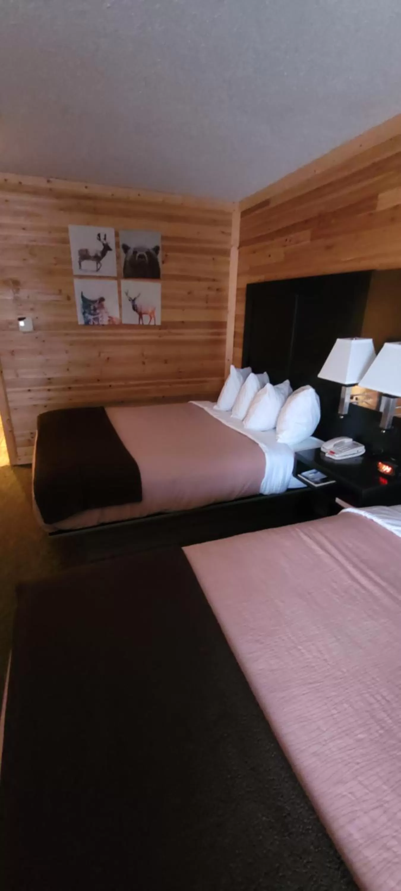 Bed in Days Inn by Wyndham Cadillac