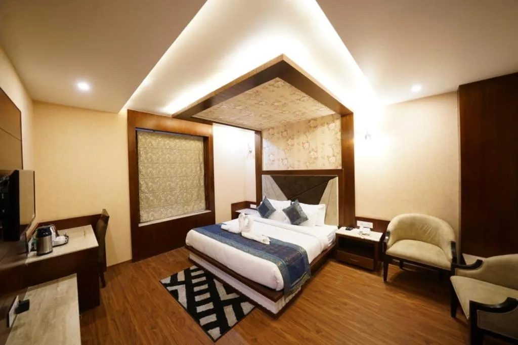 Bed in Square Inn Hotel