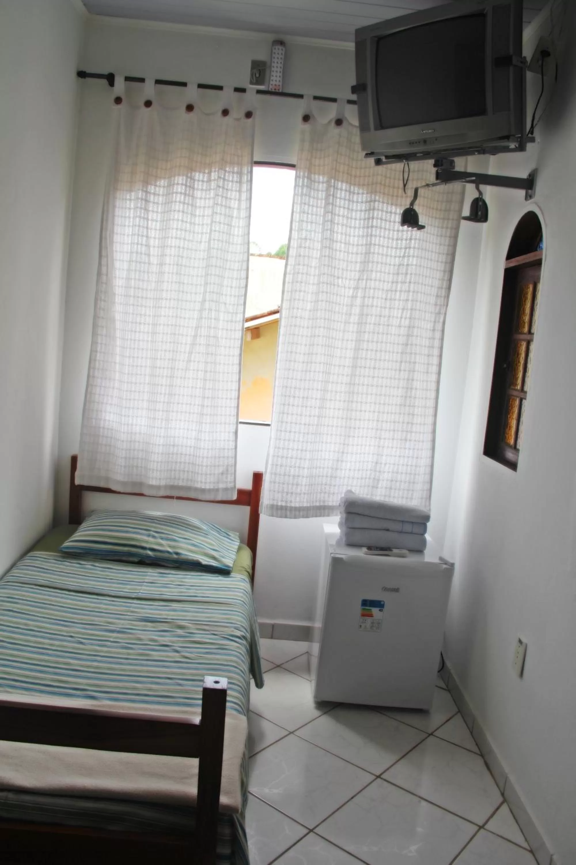 Bed in Pousada da Rose Paraty