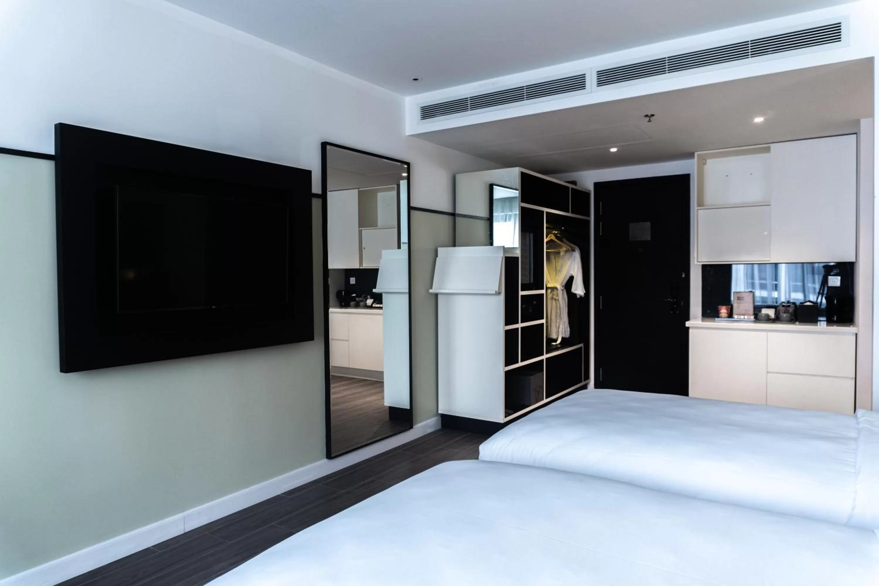 Photo of the whole room, Bed in M Village Hotel Tôn Thất Đạm