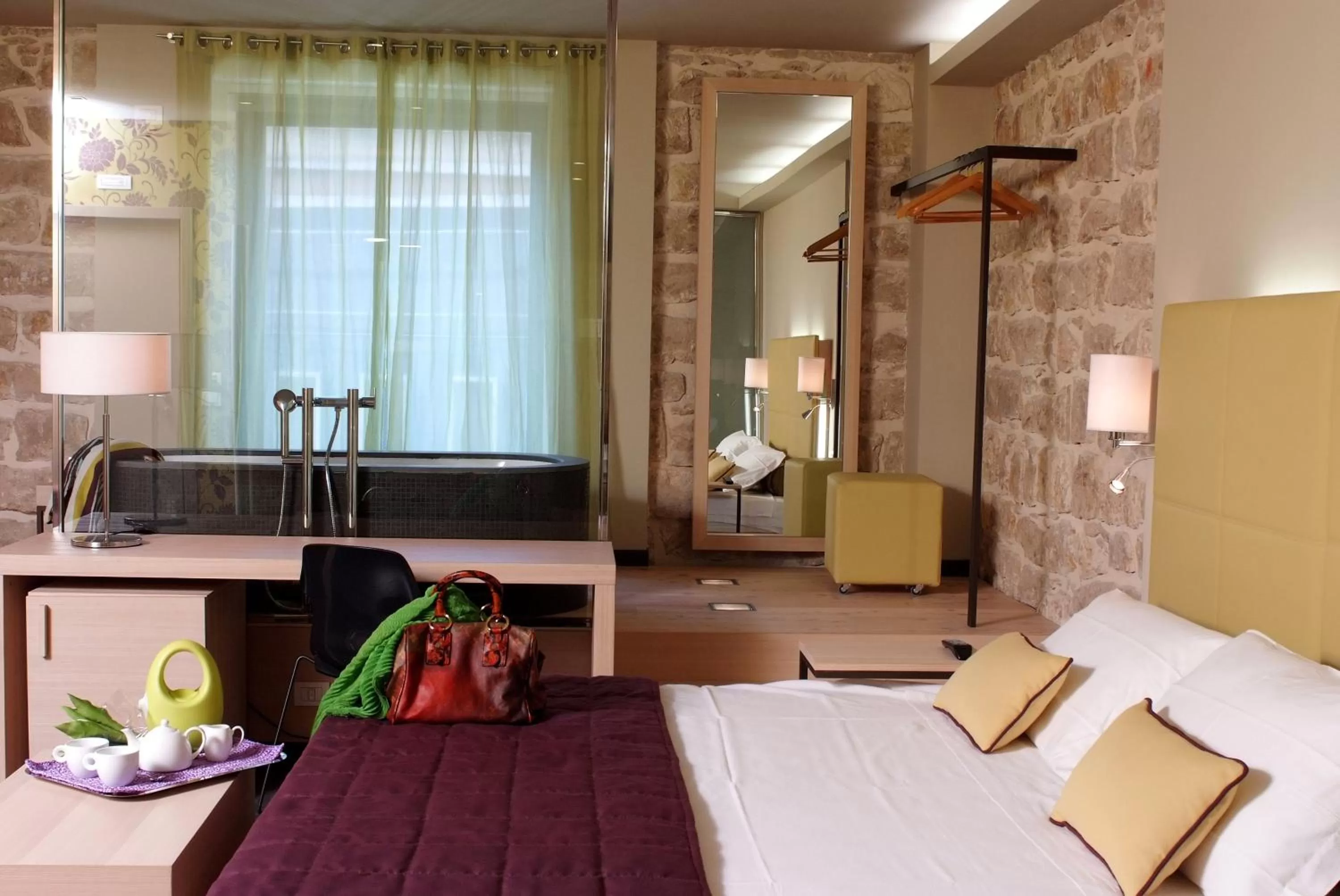 Photo of the whole room, Bed in El Homs Palace Hotel