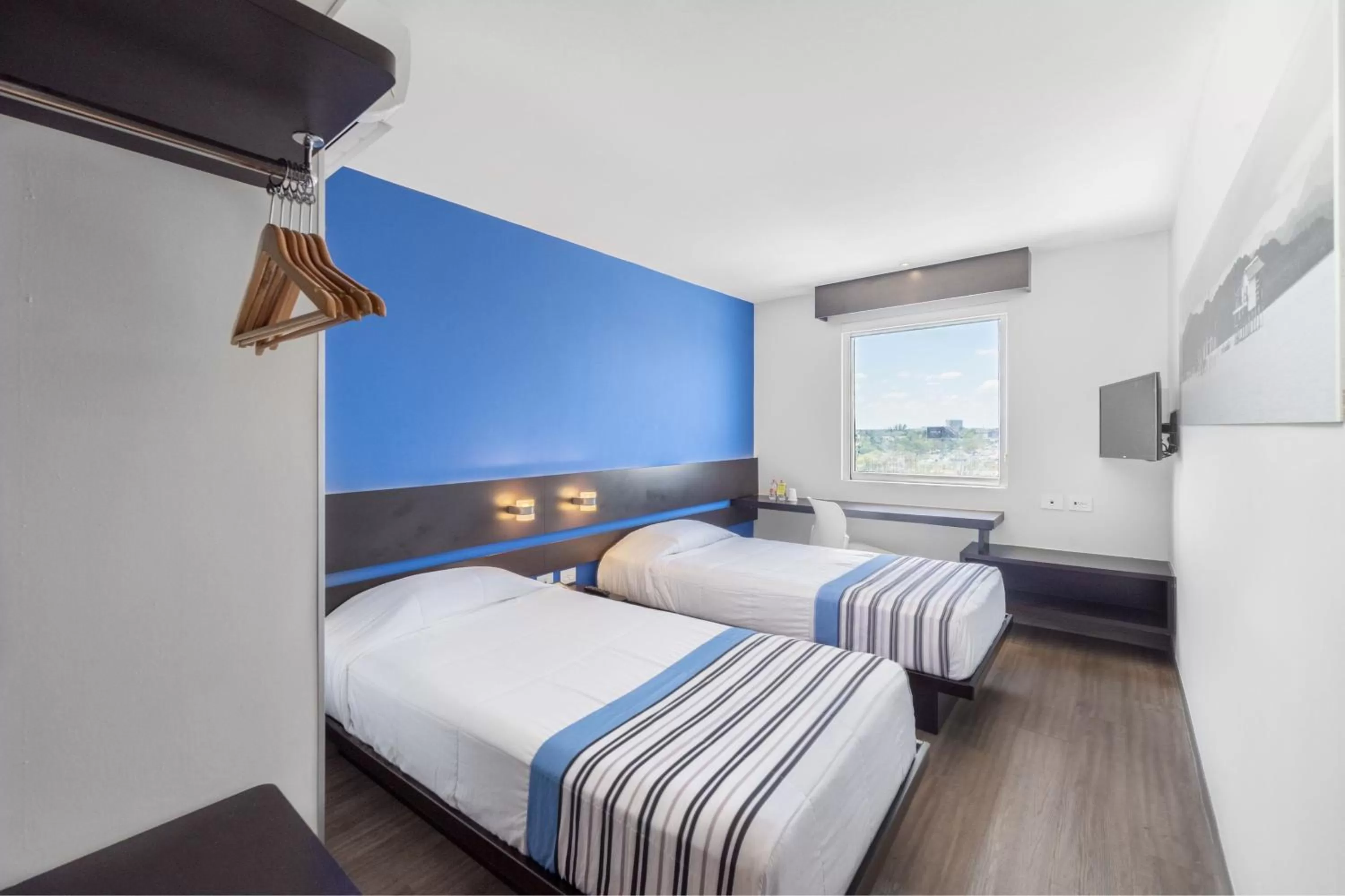 Bedroom, Bed in City Express Junior by Marriott Merida Altabrisa