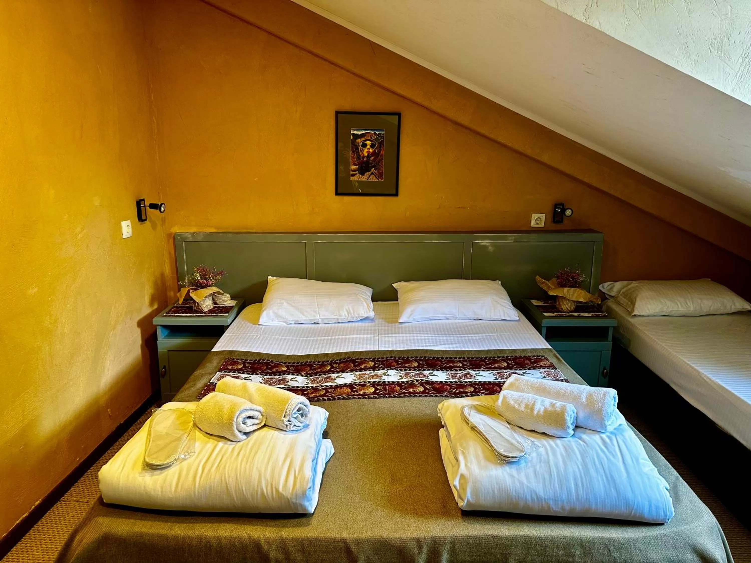 Bed in Kindli Boutique Hotel