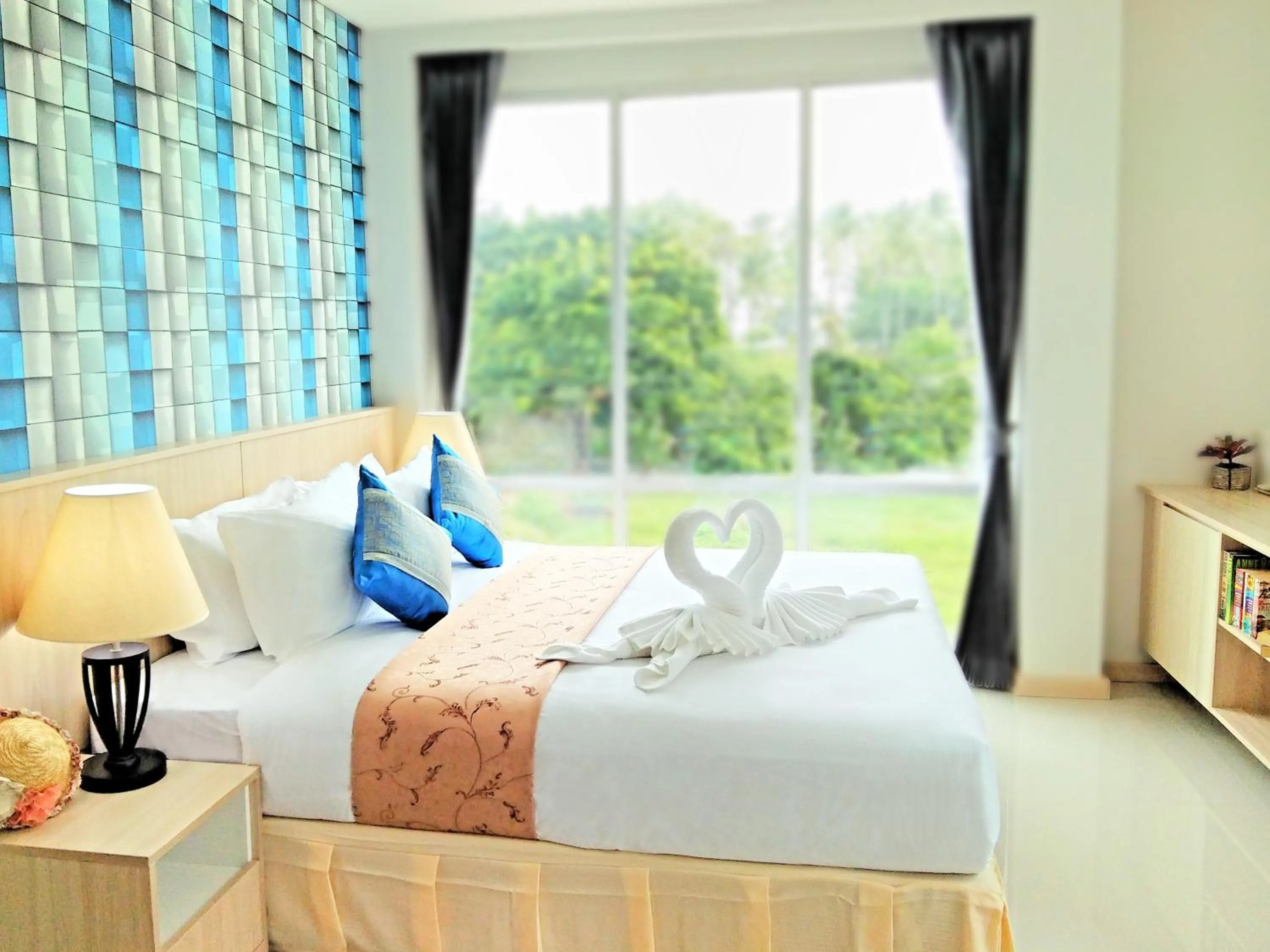 Bed in The Wings Boutique Hotels Krabi Ko Lanta