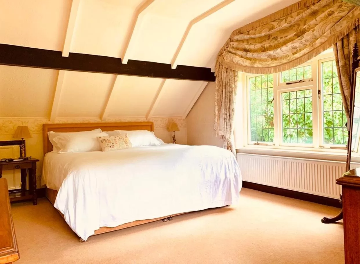 Bed in The Stanwick Hotel