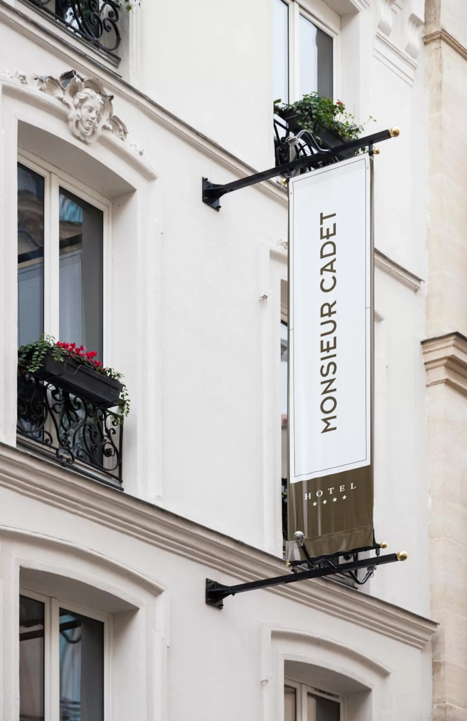 Property logo or sign in Monsieur Cadet Hotel & Spa