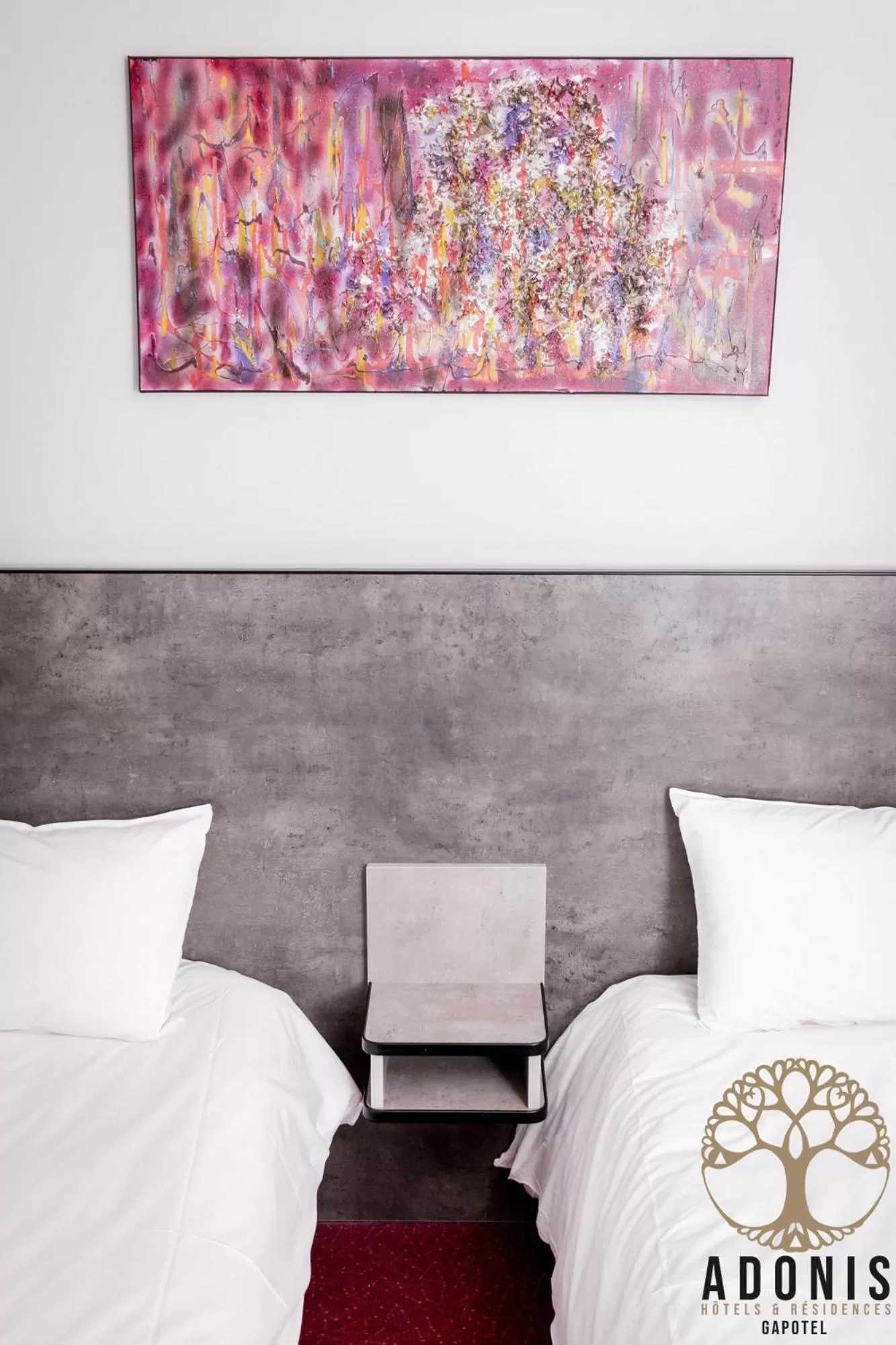 Bed in Adonis Gapotel