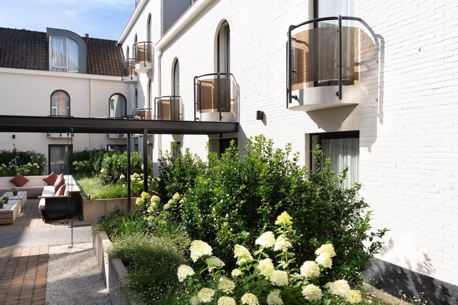 Inner courtyard view in Dukes' Academie Brugge - by Dukes' Hotel Collection