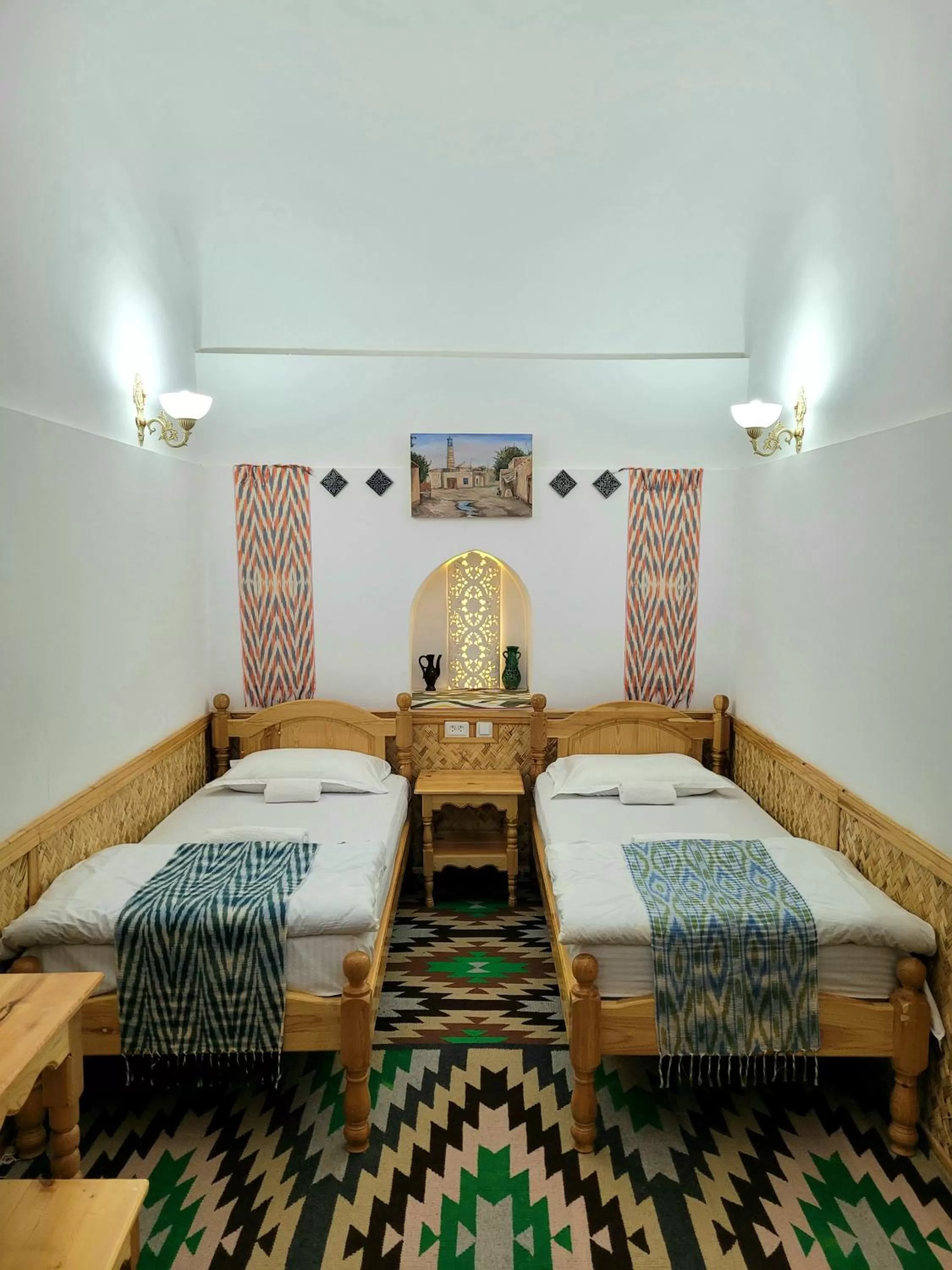 Photo of the whole room, Bed in madrasah Polvon-Qori boutique hotel XIX century
