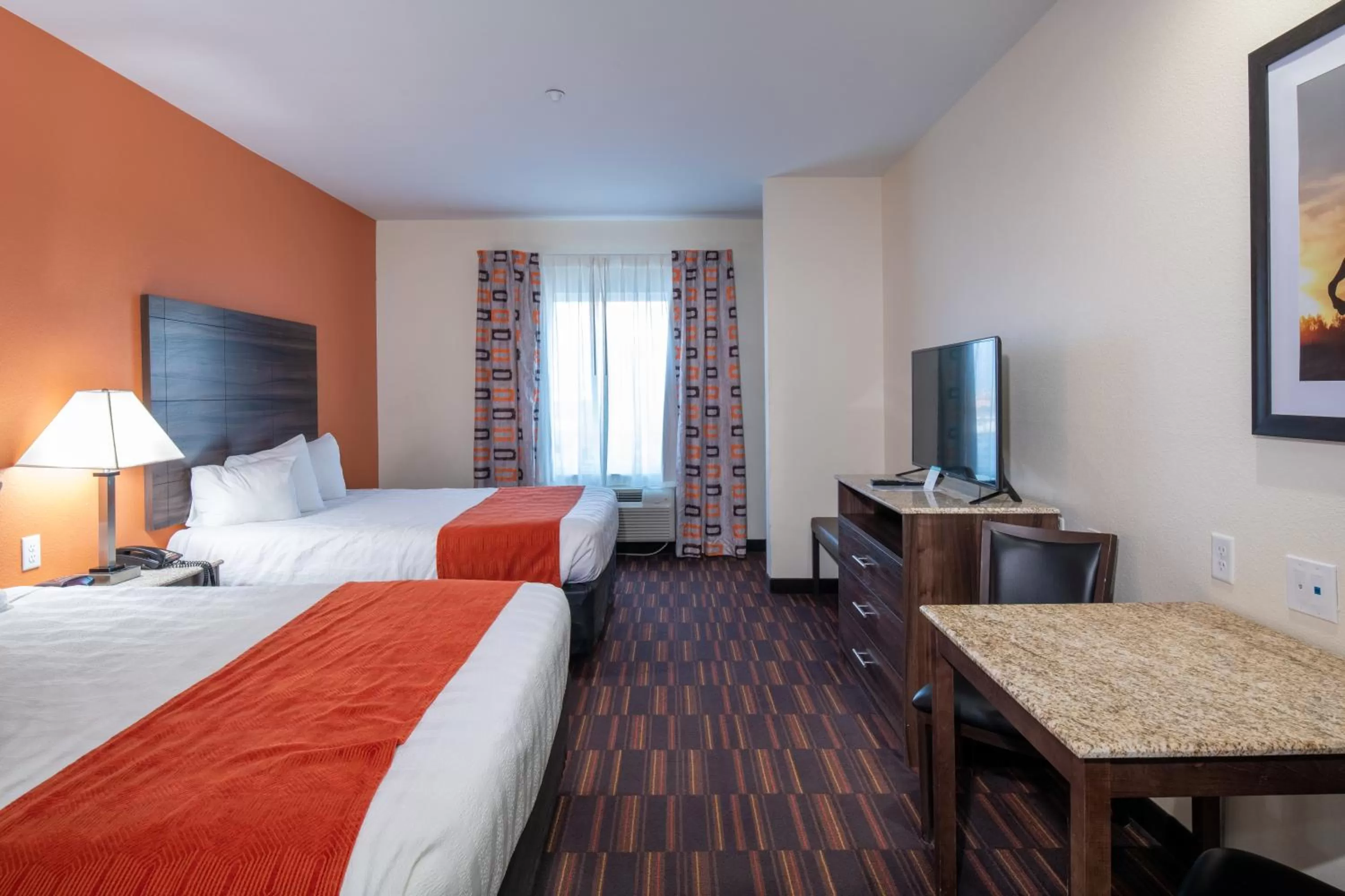 Bed in Home Away Kitchen Suites Enid