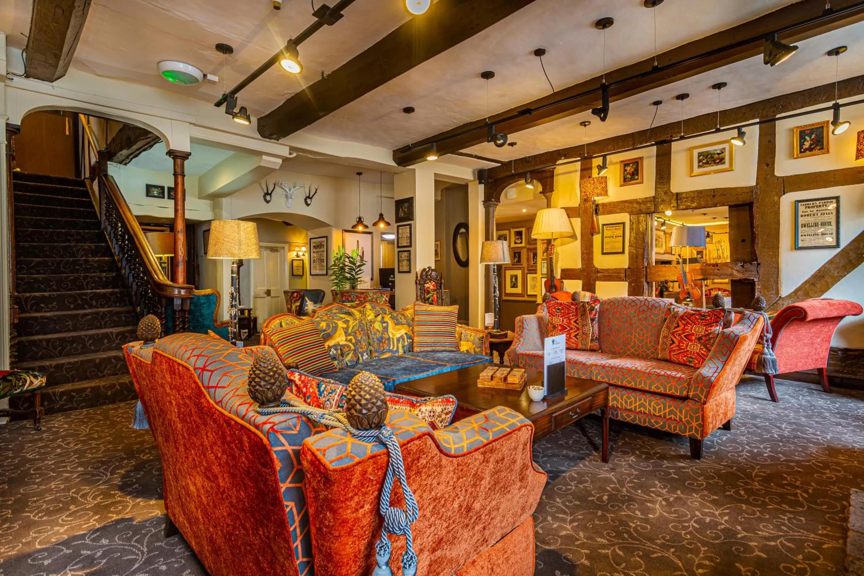 Communal lounge/ TV room in The Feathers Hotel, Ledbury - The Coaching Inn Group