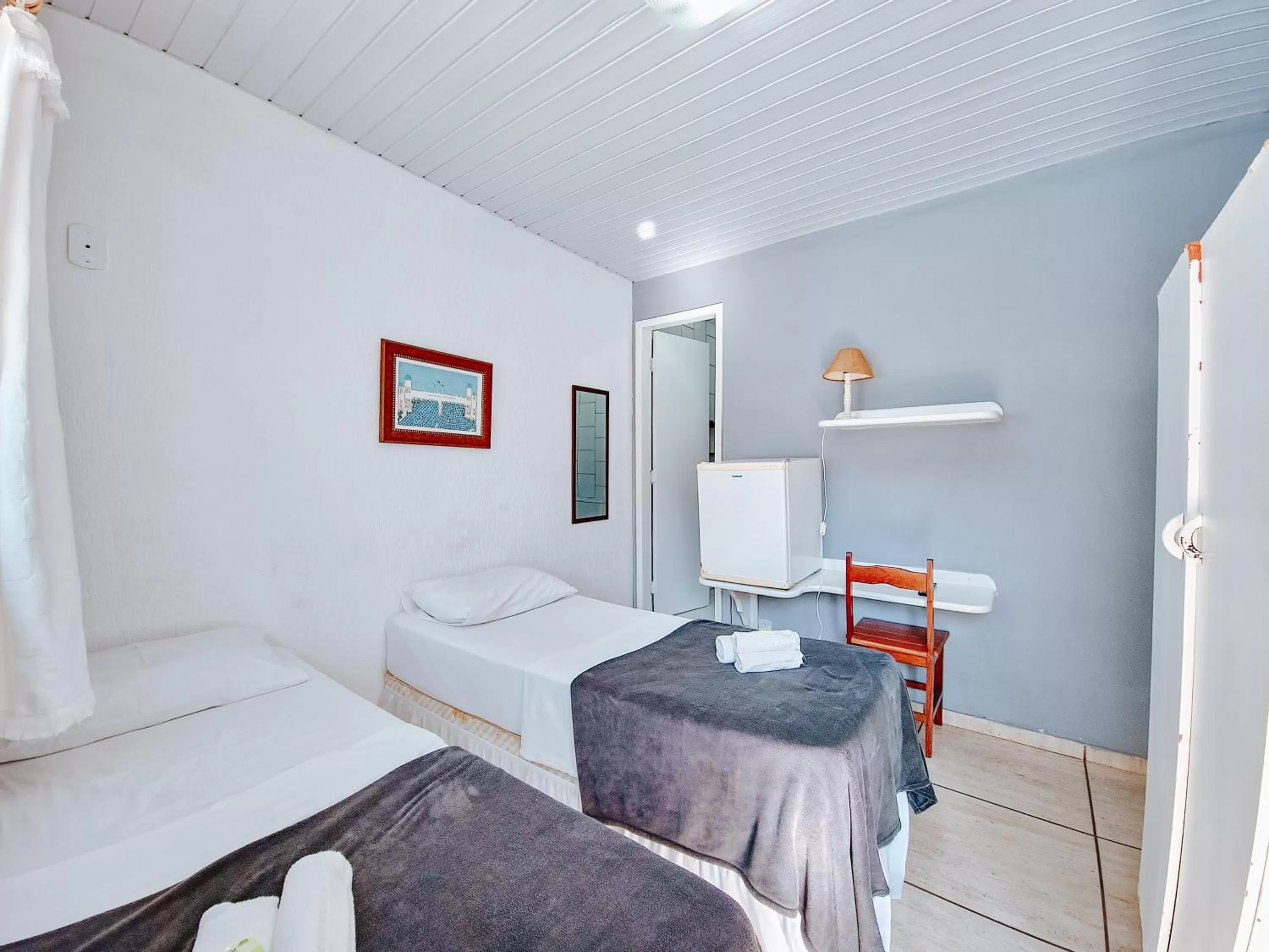 Bed in Pousada Água Marinha