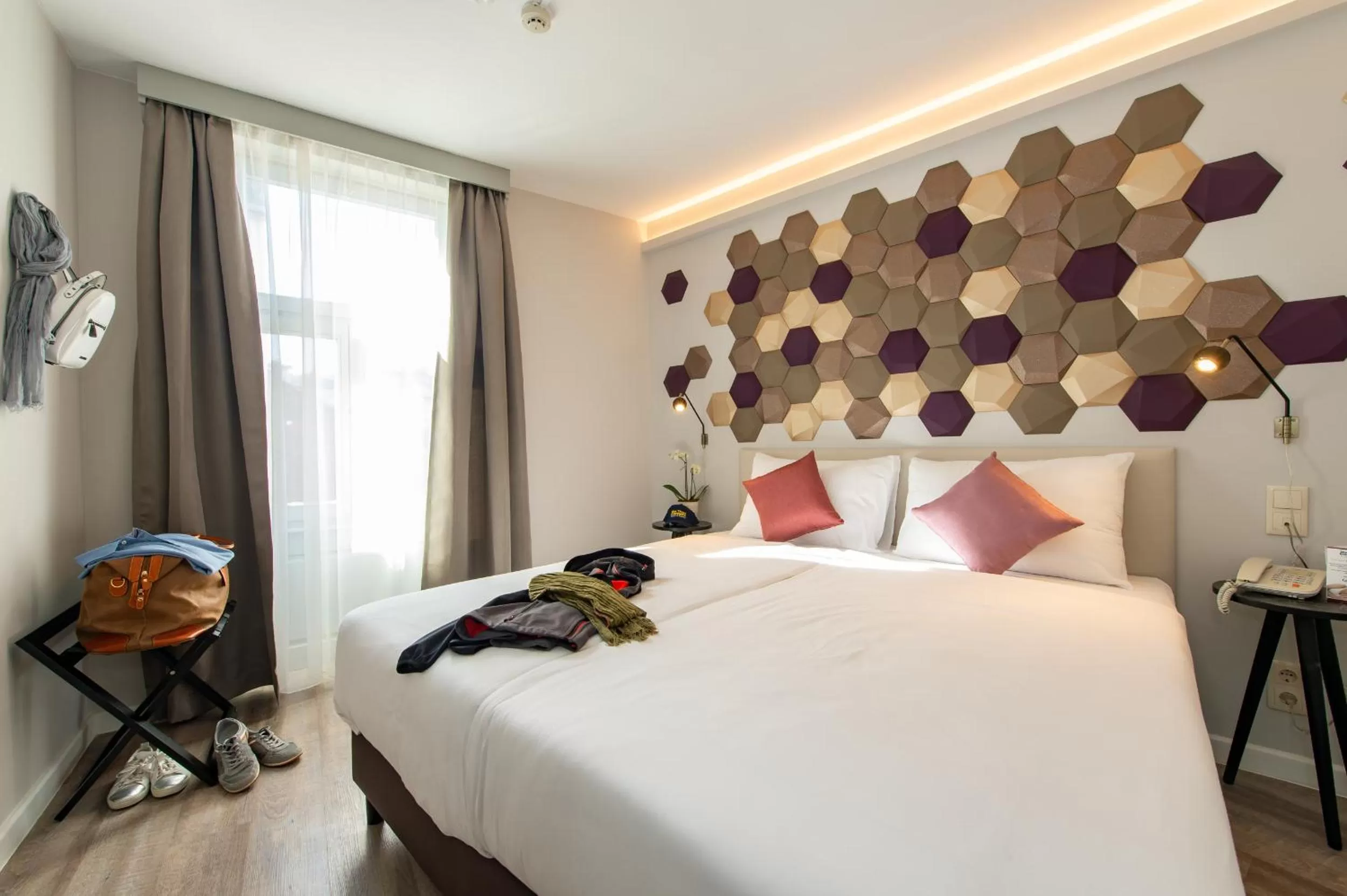 Bed in Three Corners Hotel Art