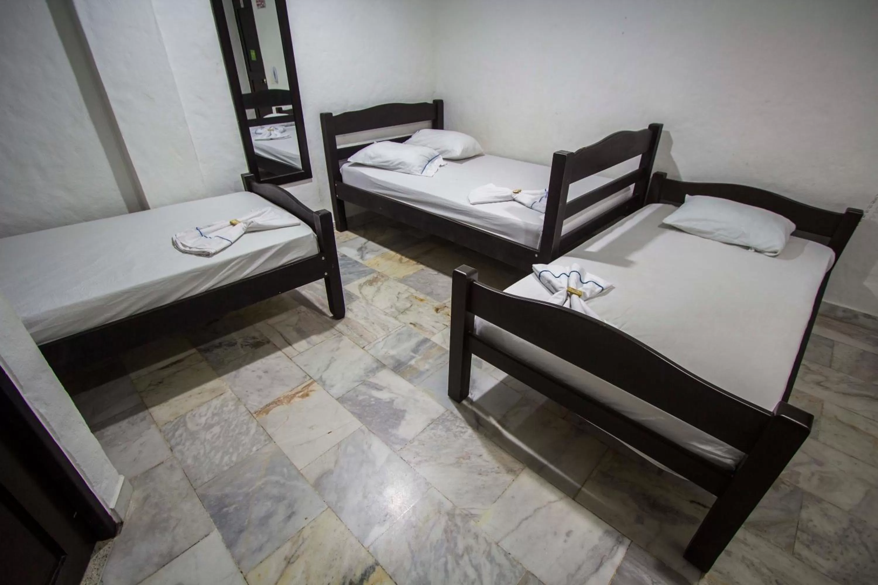 Bed in Blue Star Hotel