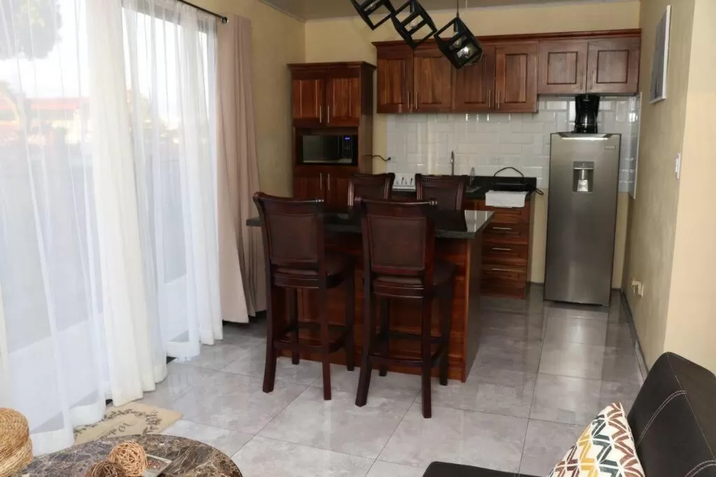 Kitchen or kitchenette, Dining Area in Airport SJO Residence - Edward & Familia Inn