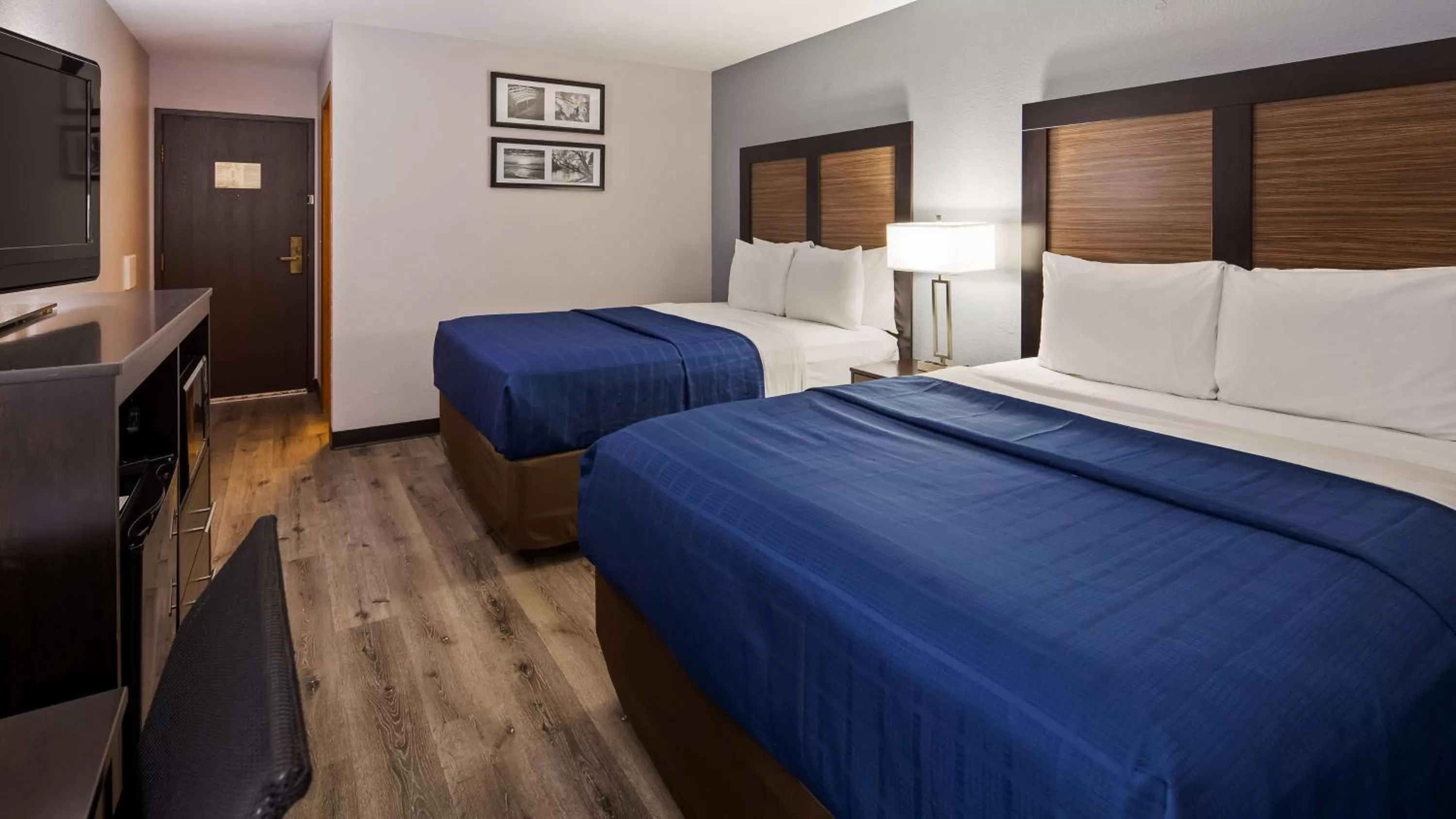 Queen Room with Two Queen Beds in Ramada by Wyndham Cedar Rapids South