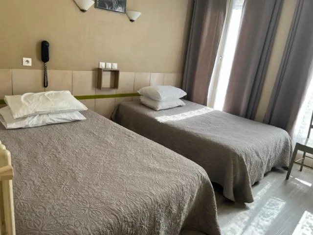 Bed in Hôtel Jarry Confort