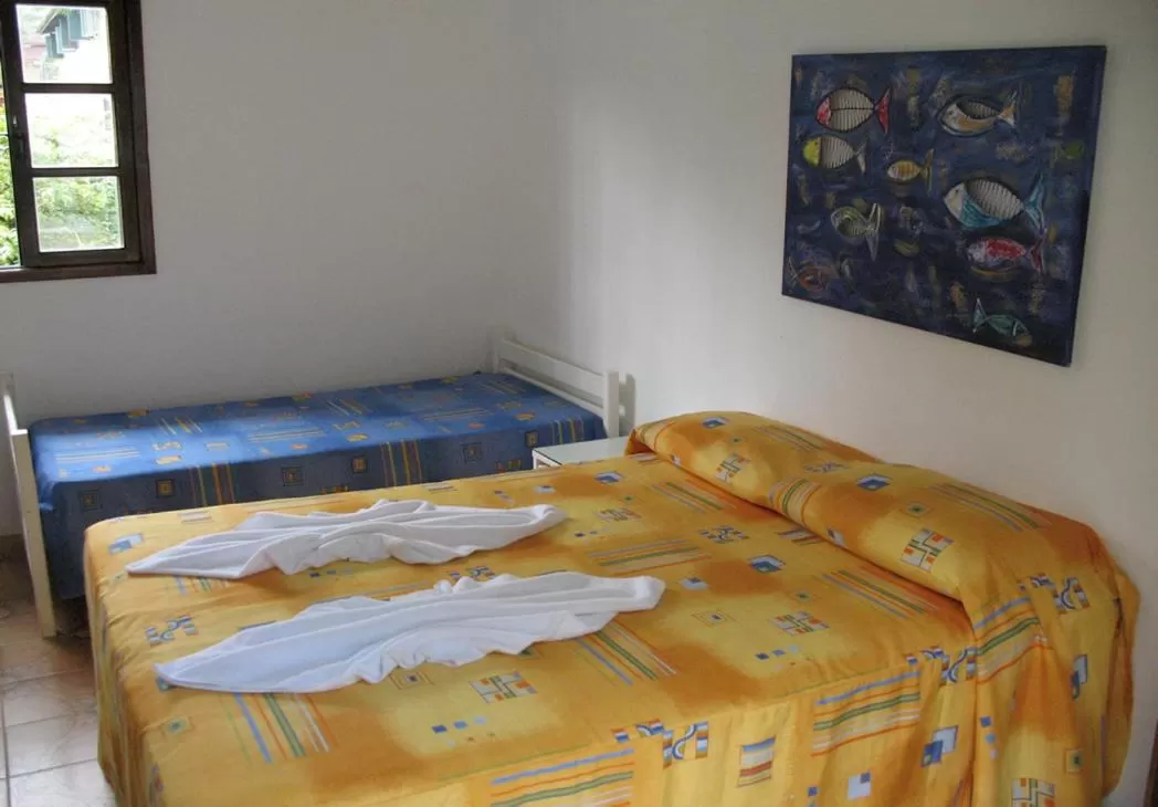 Bed in Pousada Morada Das Toninhas