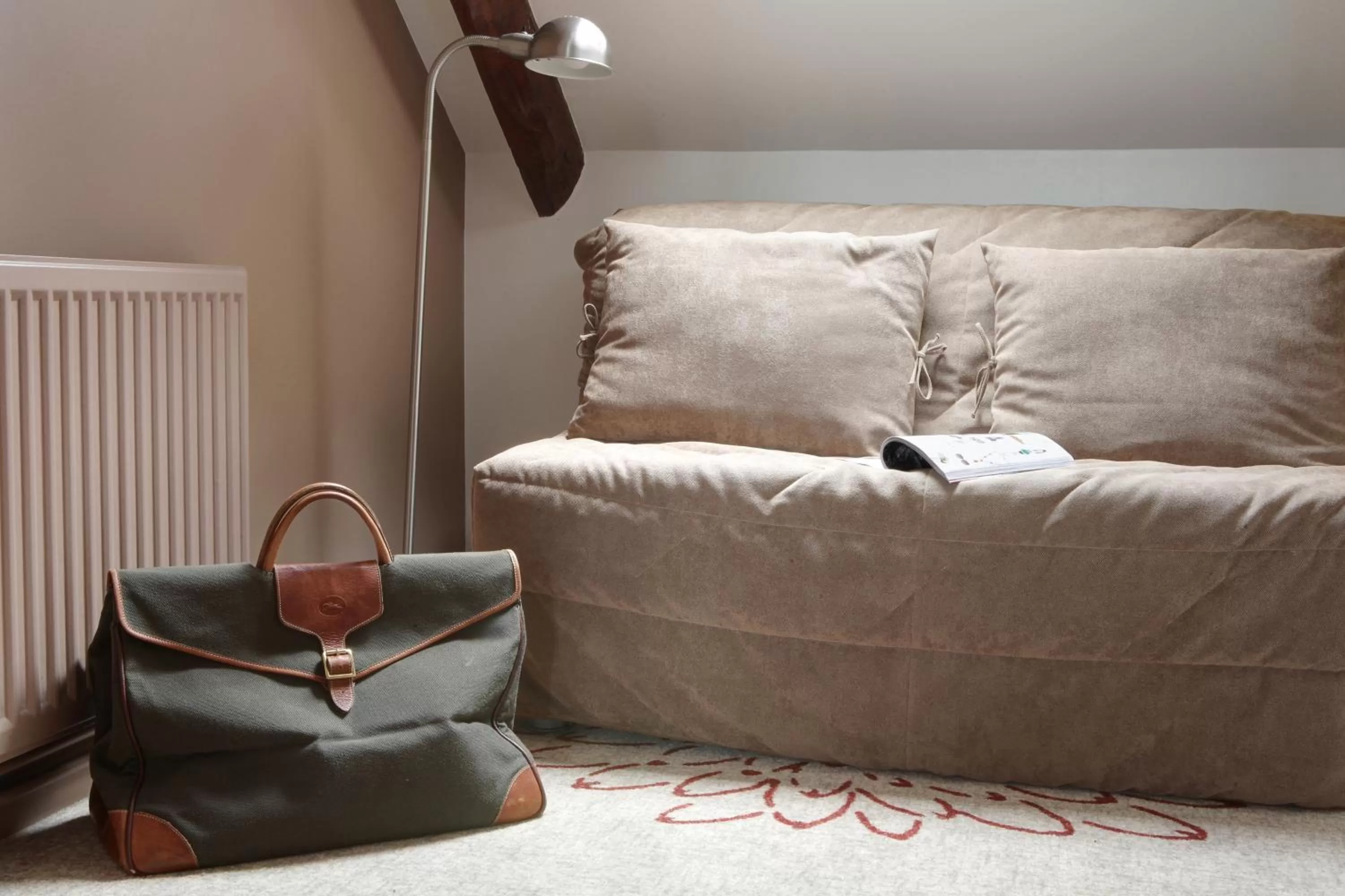 Seating area in Hôtel Le Benhuyc
