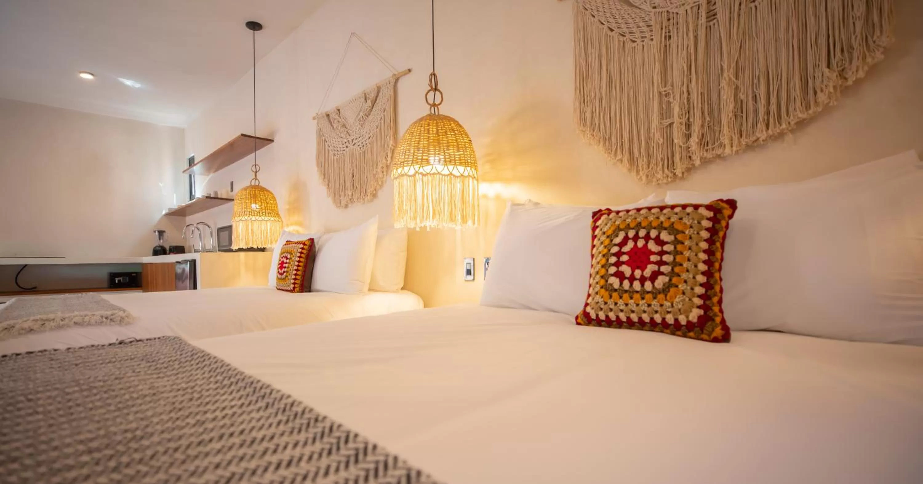 Kitchen or kitchenette, Bed in Nuee Hotel & Beach Club