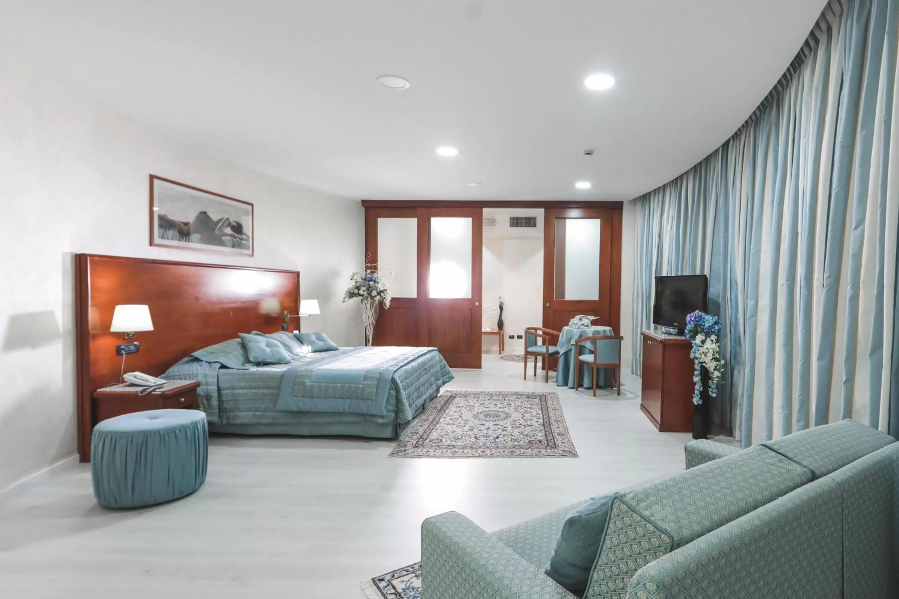 Bed in Edra Palace Hotel & Ristorante