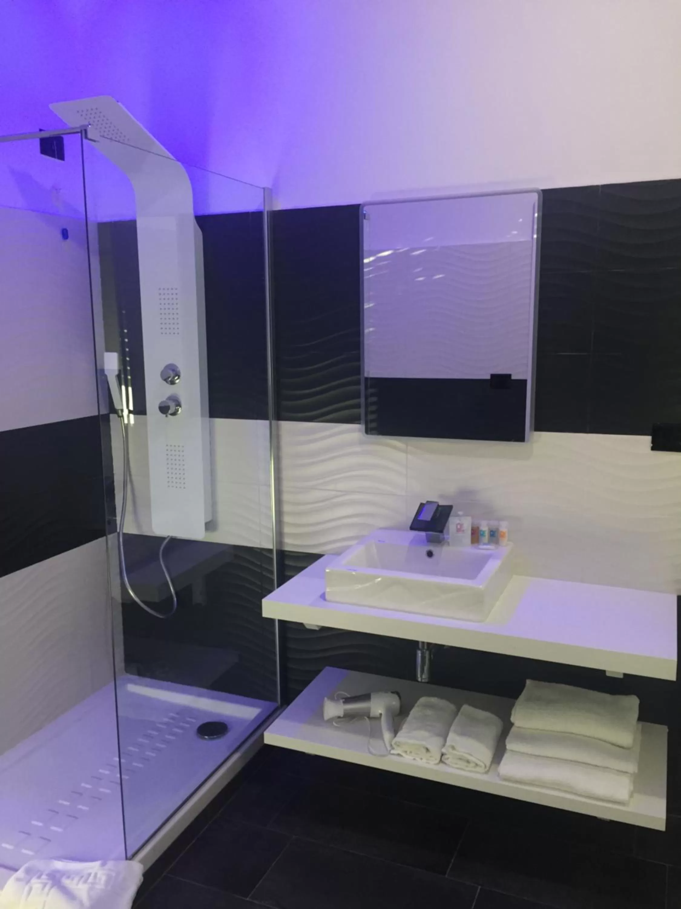 Bathroom in Escape Luxury Suite - CA Domus Collection